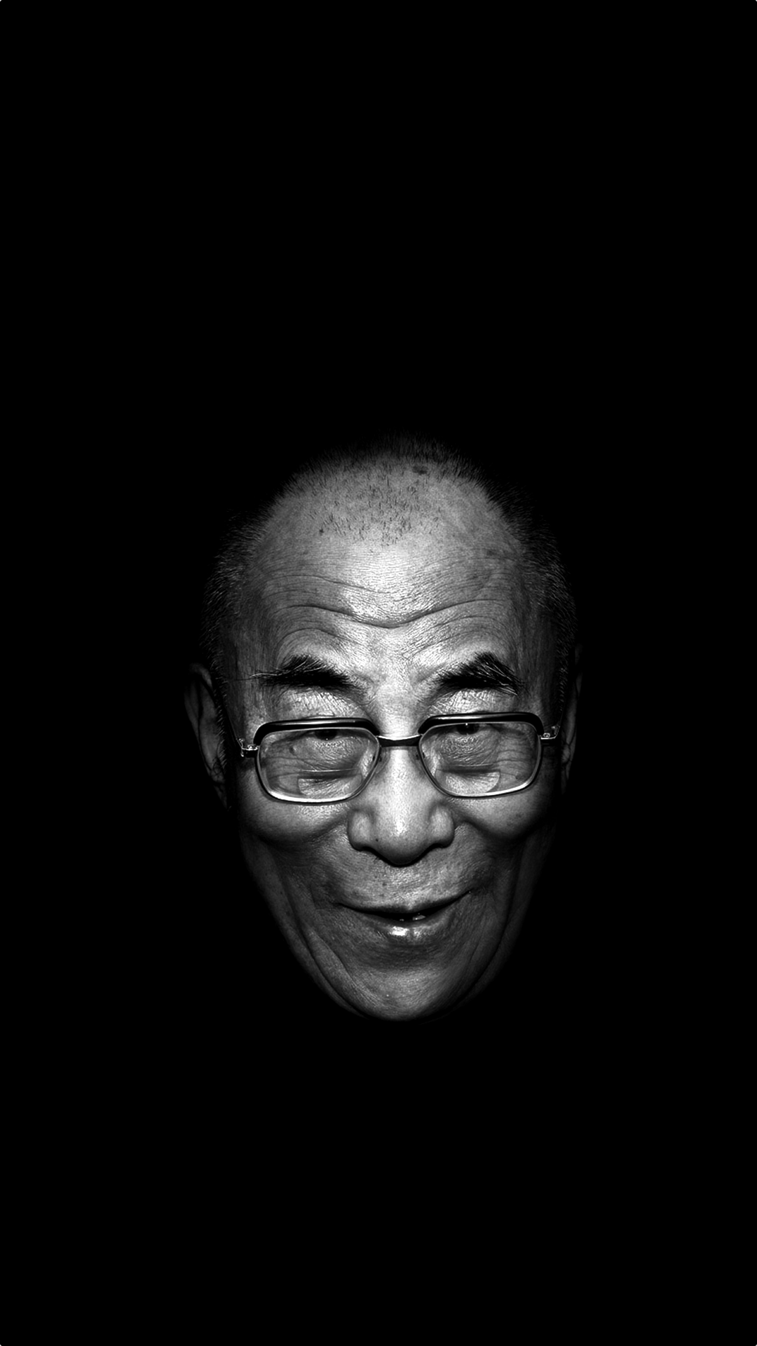 Dalai Lama portrait with glasses on black background HD Wallpaper