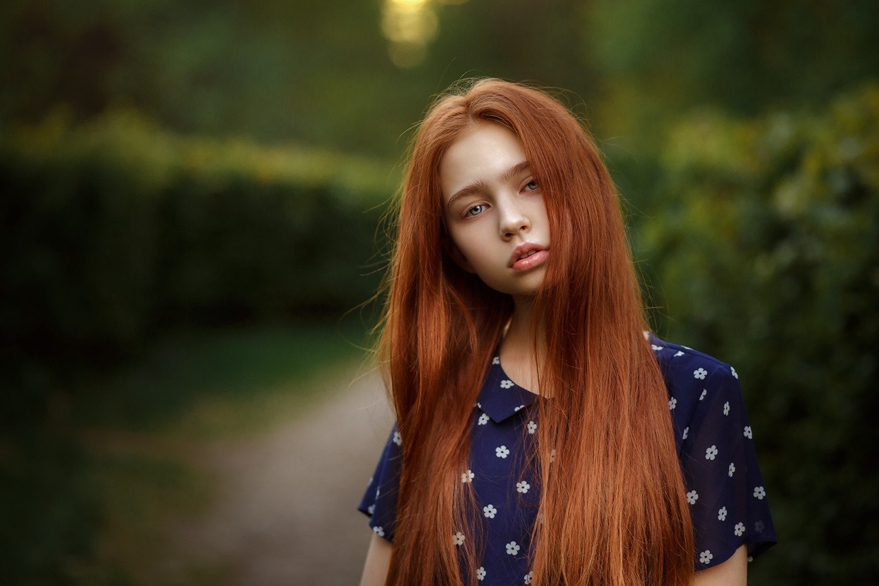 Young redhead girl with long hair in a blue dress HD Wallpaper
