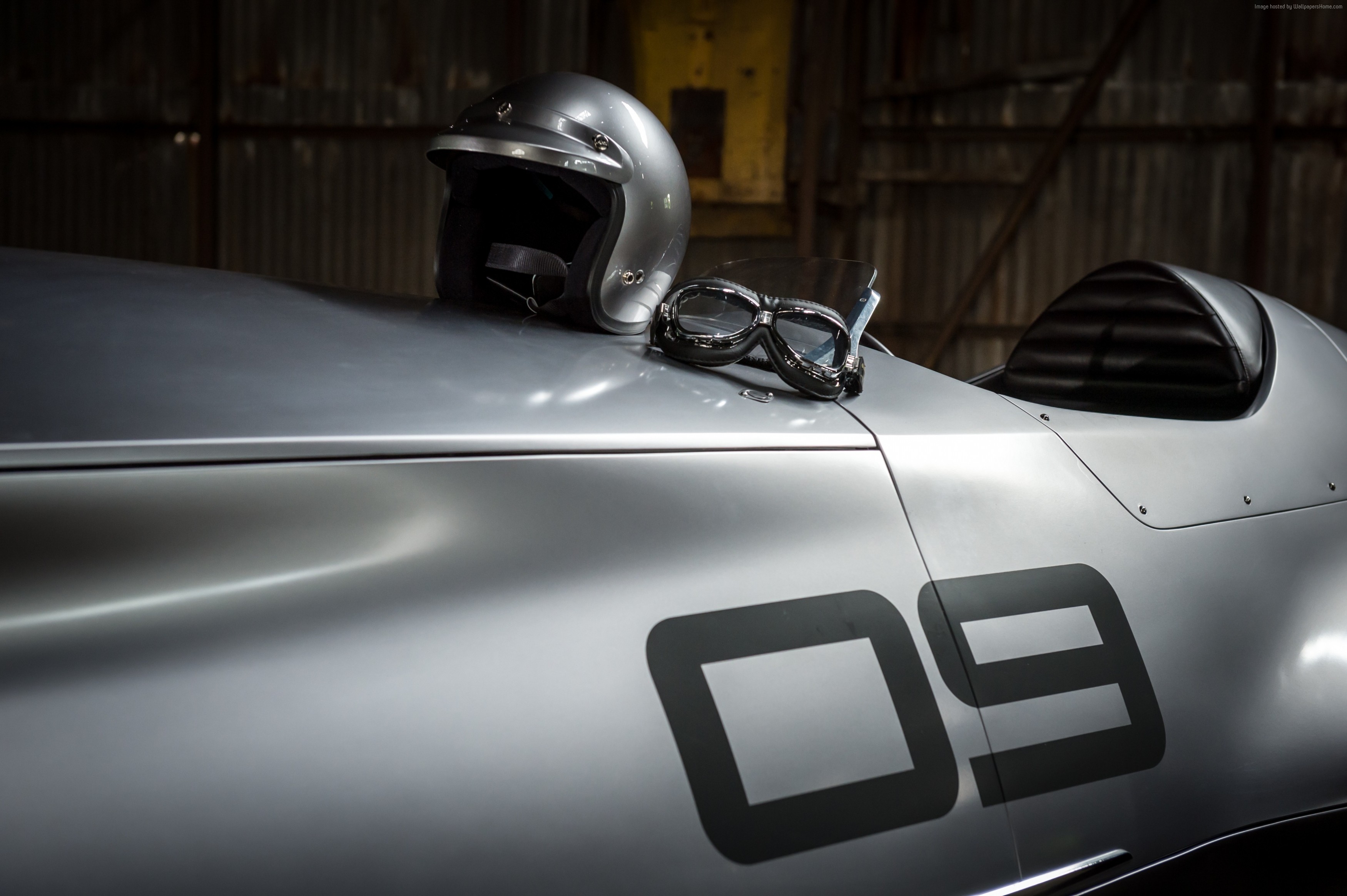Infiniti Prototype 9 electric car with helmet and goggles HD Wallpaper