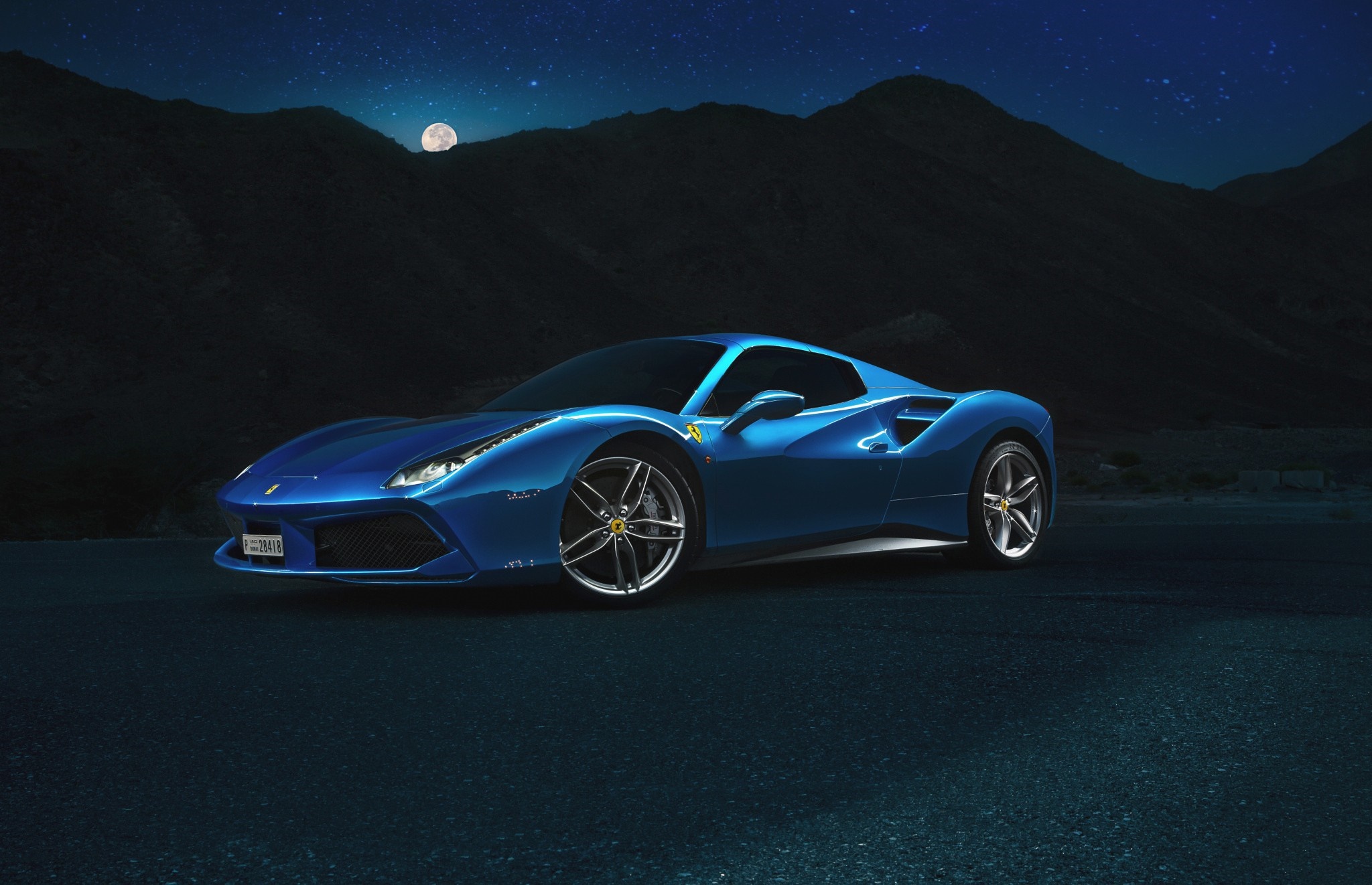 Blue Ferrari 488 GTB parked at night under the moon HD Wallpaper