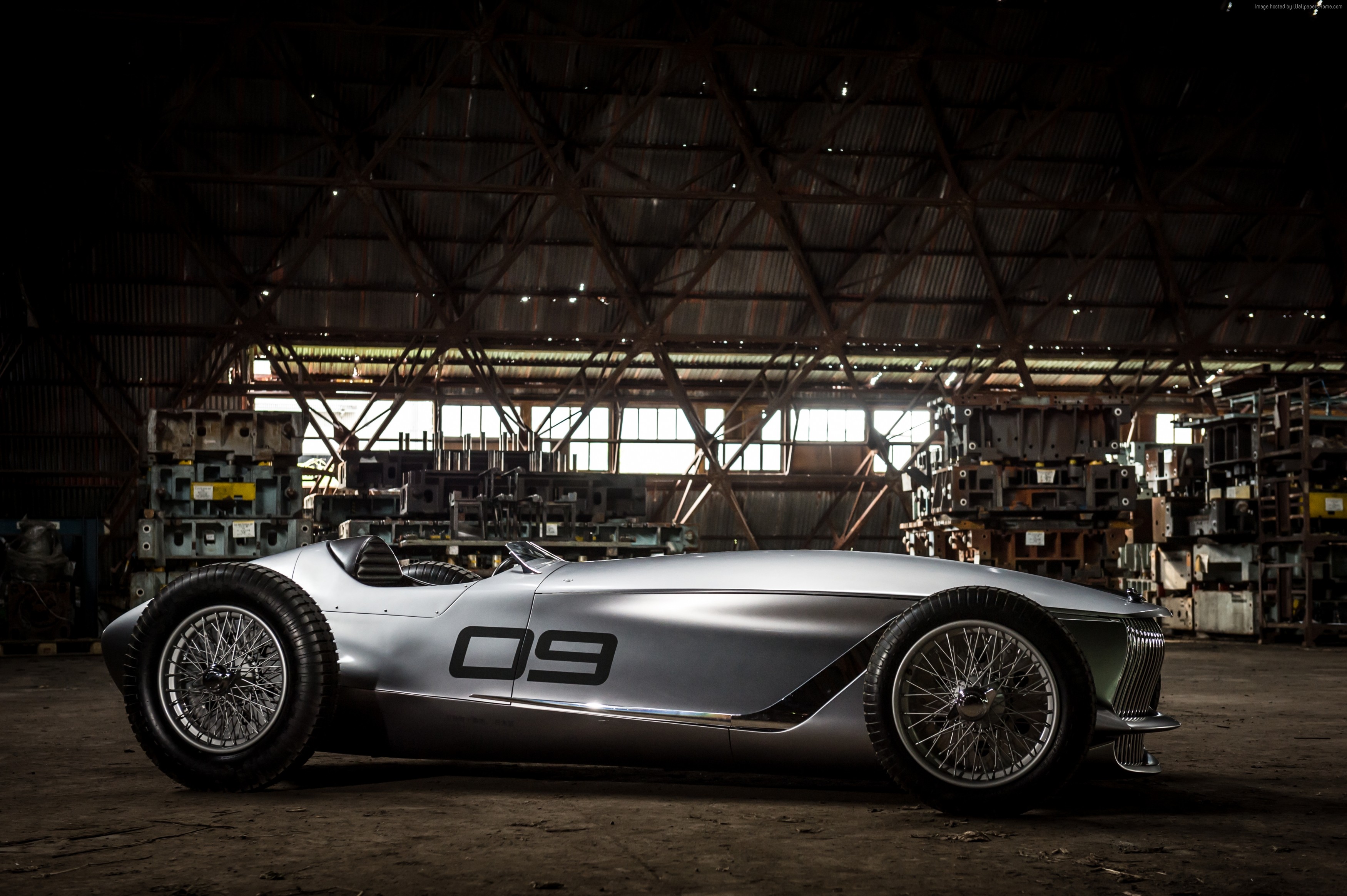 Infiniti Prototype 9 electric car in a warehouse HD Wallpaper