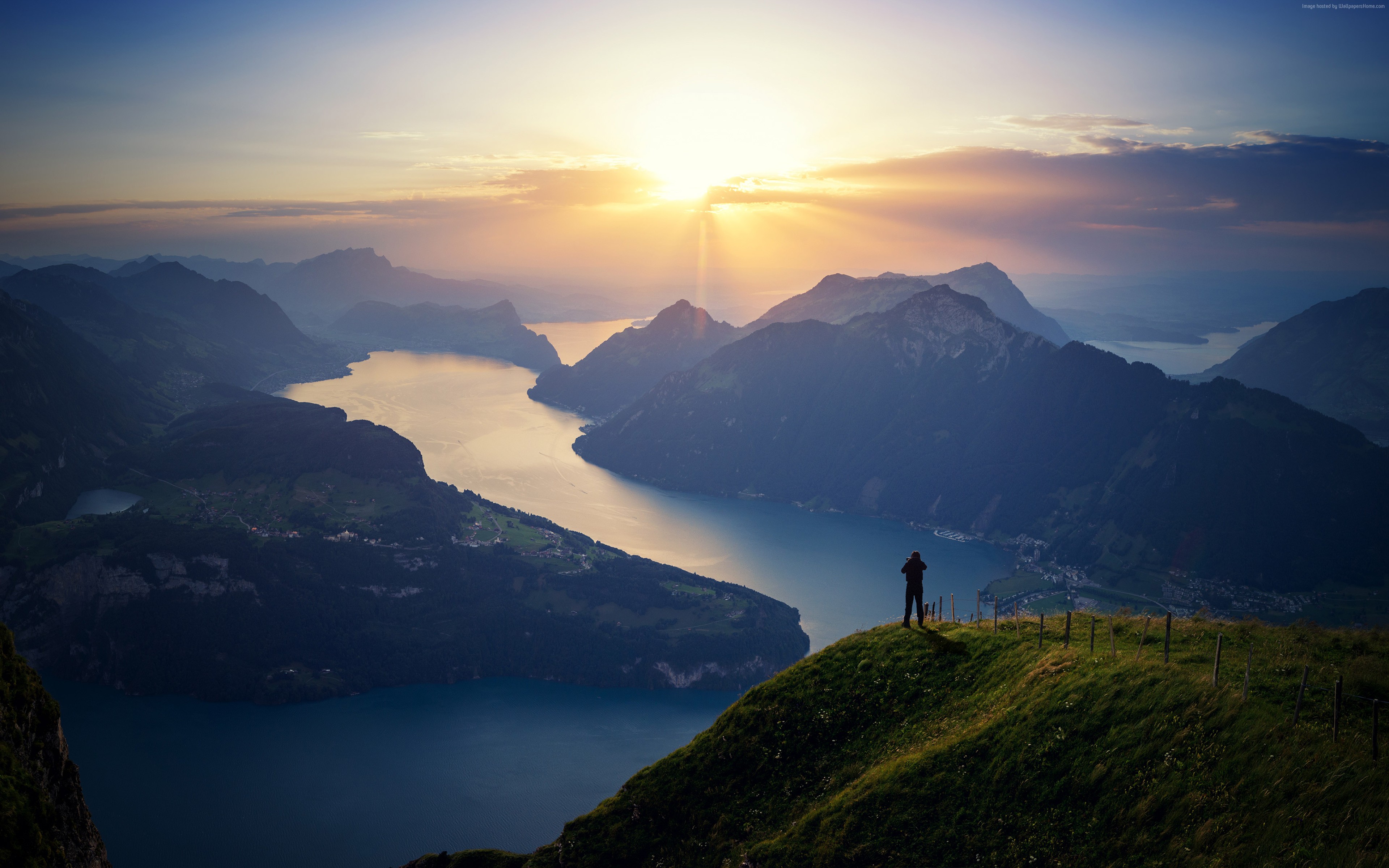 Man overlooking Lake Lucerne, Switzerland at sunrise HD Wallpaper