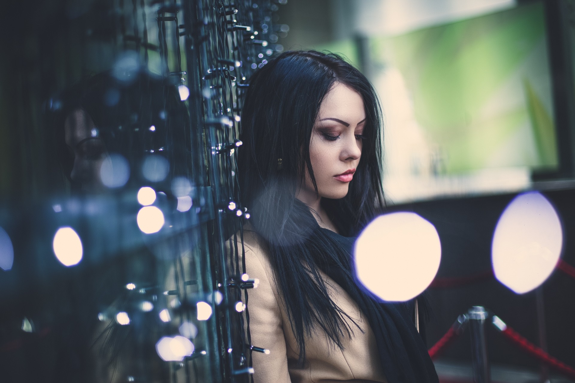 Woman with black hair and scarf near lights HD Wallpaper