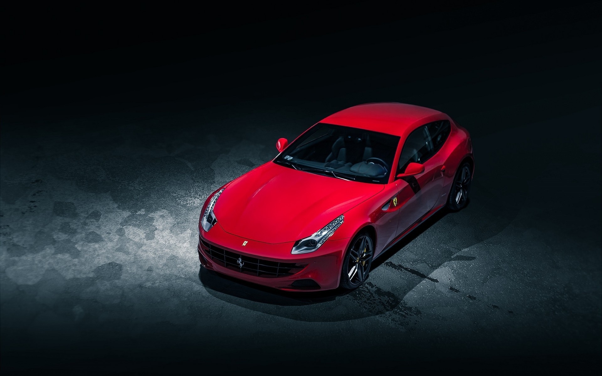 Red Ferrari FF shooting brake parked on a dark surface HD Wallpaper