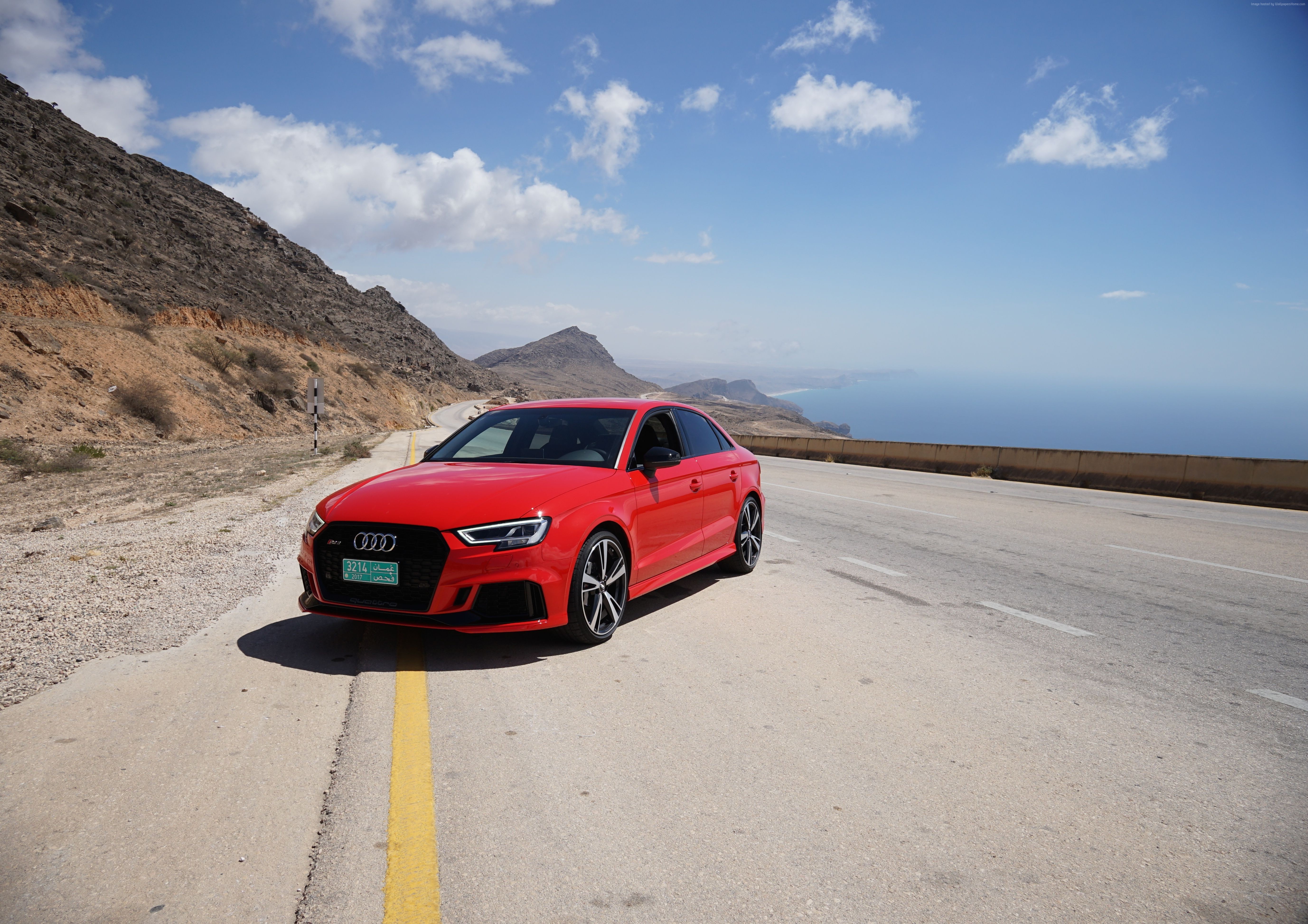 Red Audi RS 3 on a coastal road HD Wallpaper