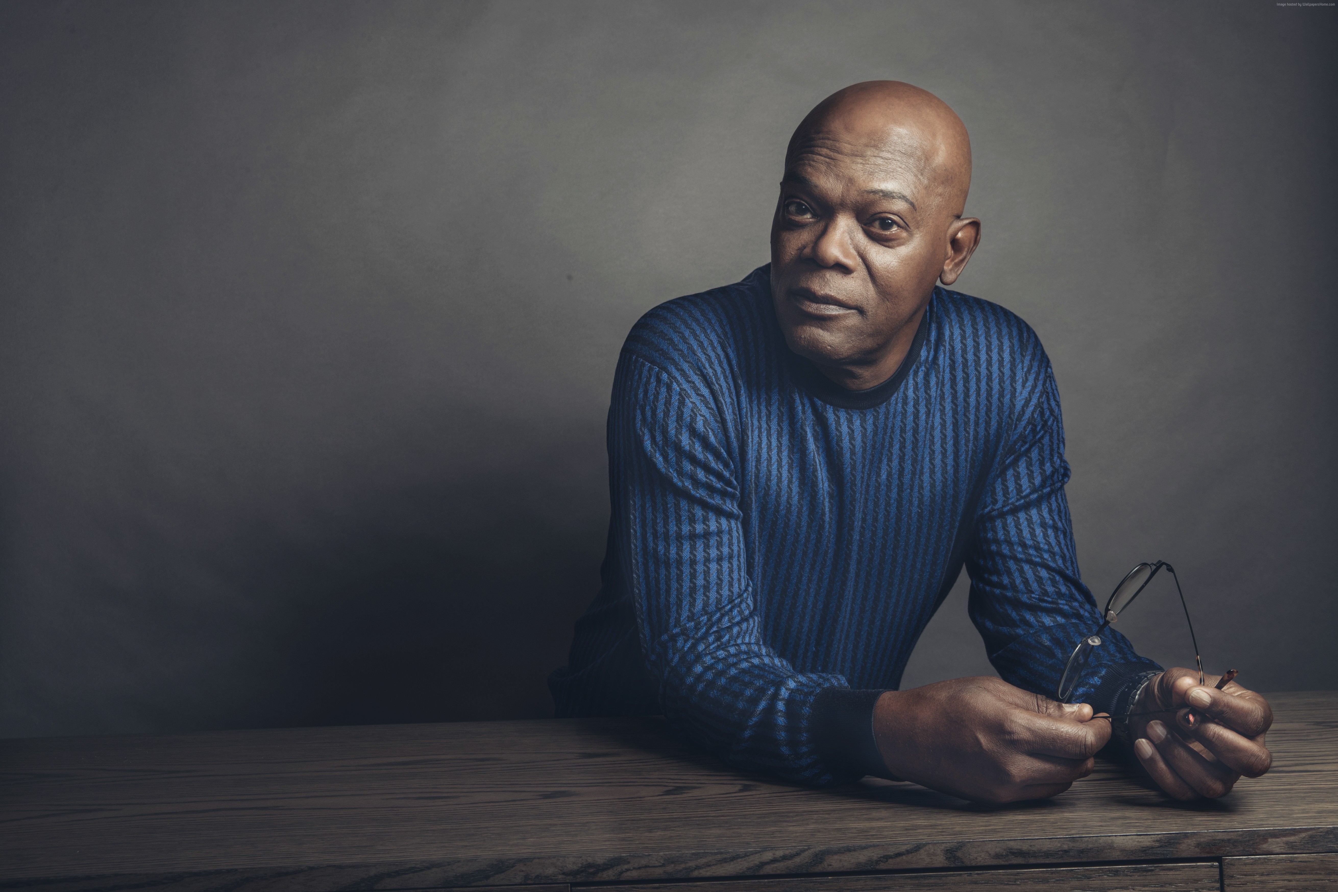 Samuel L. Jackson sitting at a table HD Wallpaper