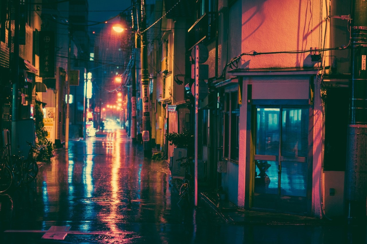 Rainy night street in Japan with colorful reflections HD Wallpaper