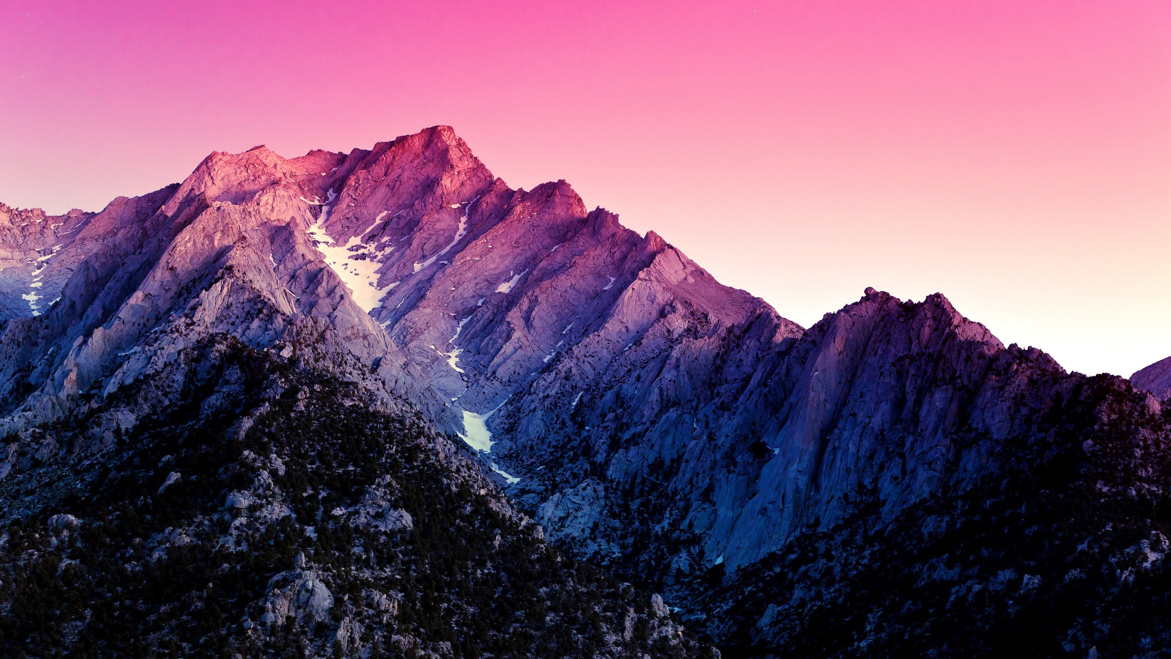 Mountain range at sunset with pink and purple sky HD Wallpaper