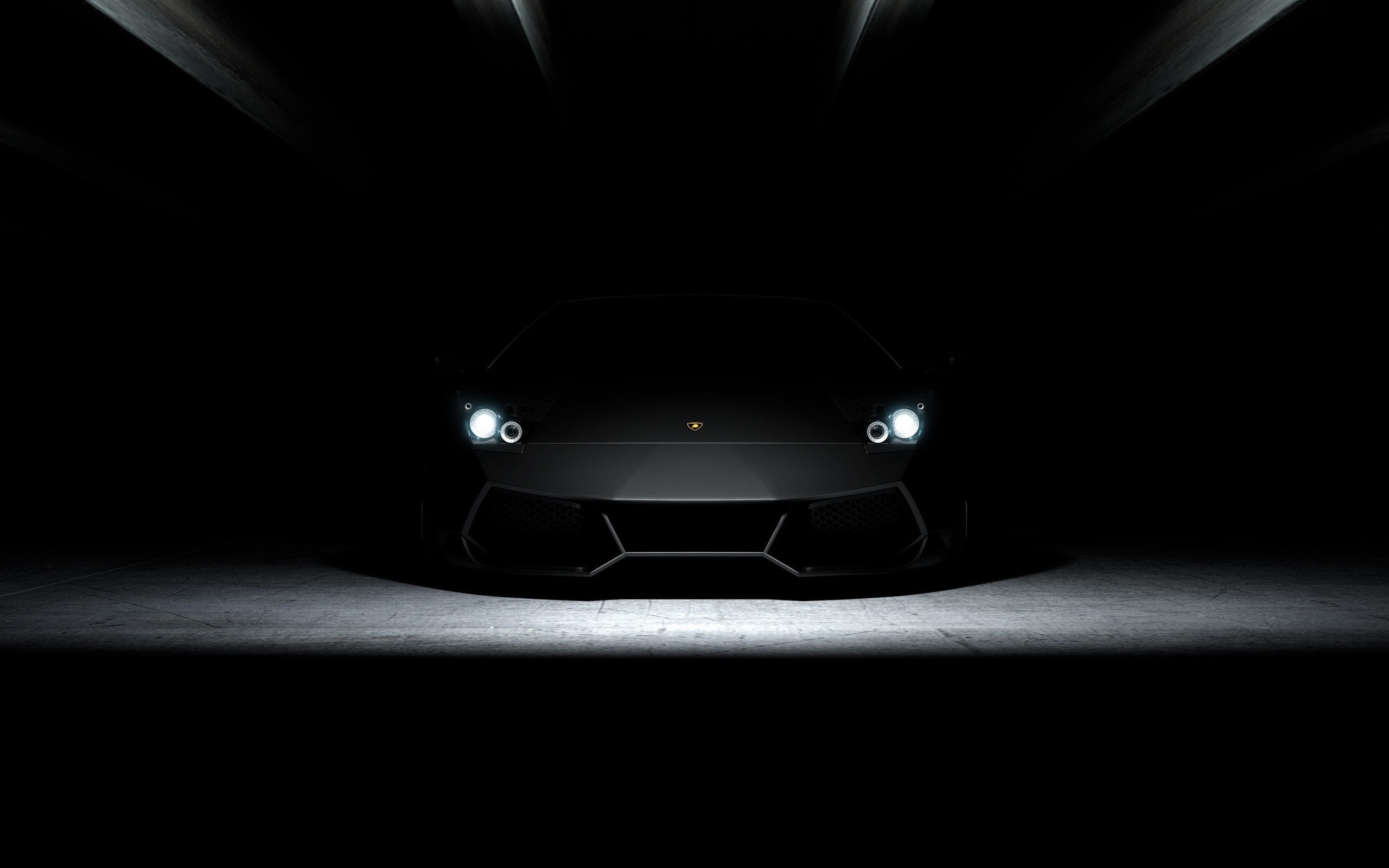 Black Lamborghini sports car with headlights on HD Wallpaper