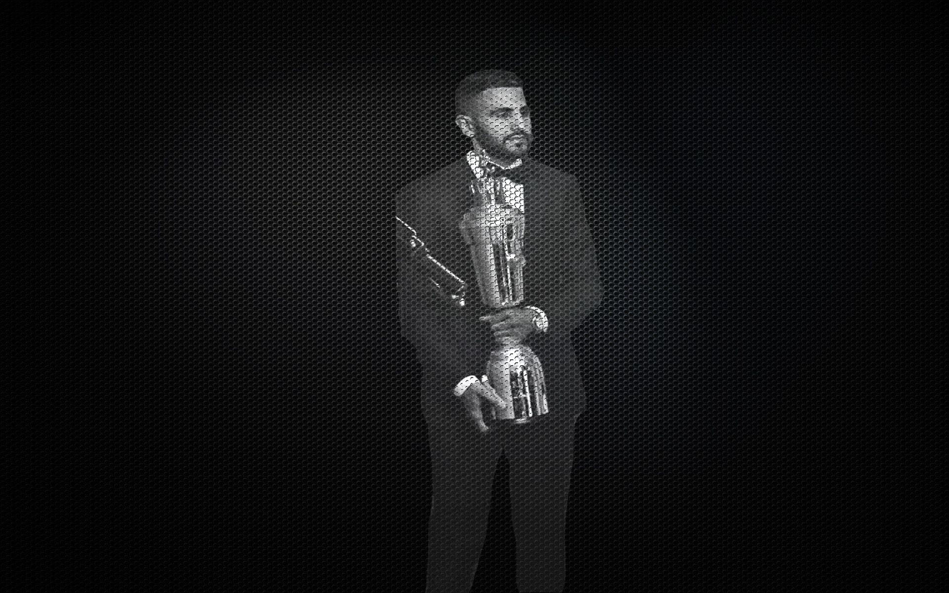 Man in tuxedo holding a trophy HD Wallpaper