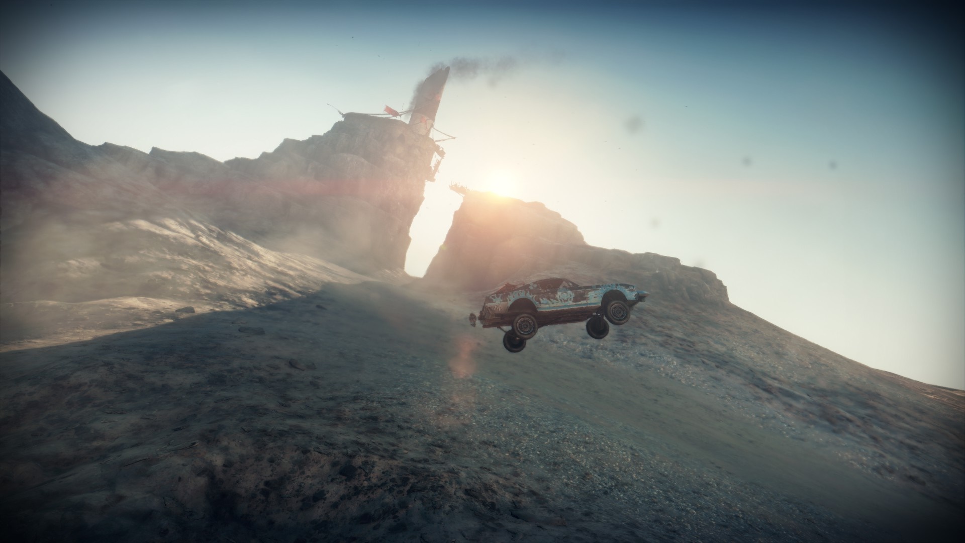 Mad Max game screenshot of a car jumping over a canyon HD Wallpaper
