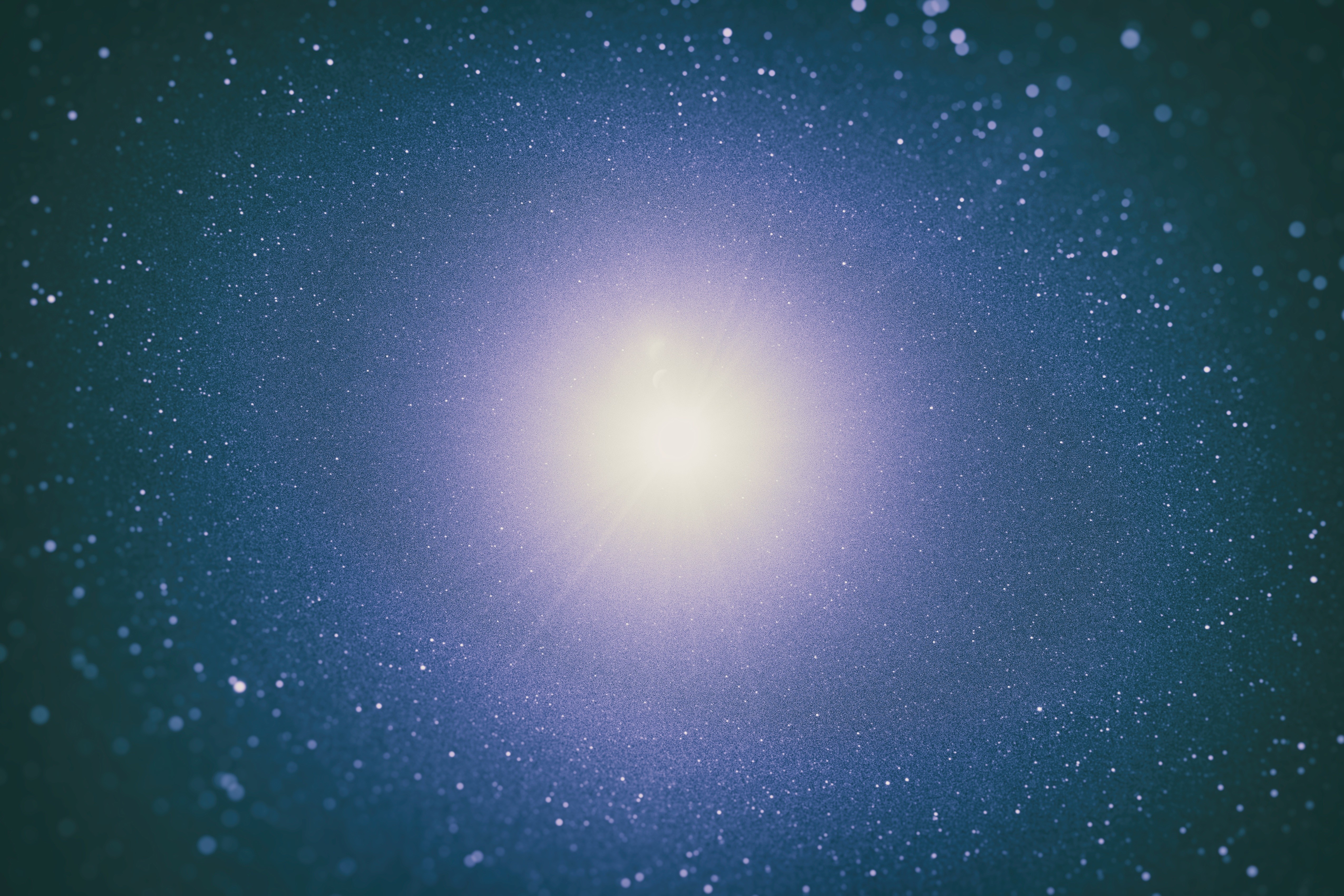 A bright light in the center of a galaxy with stars HD Wallpaper