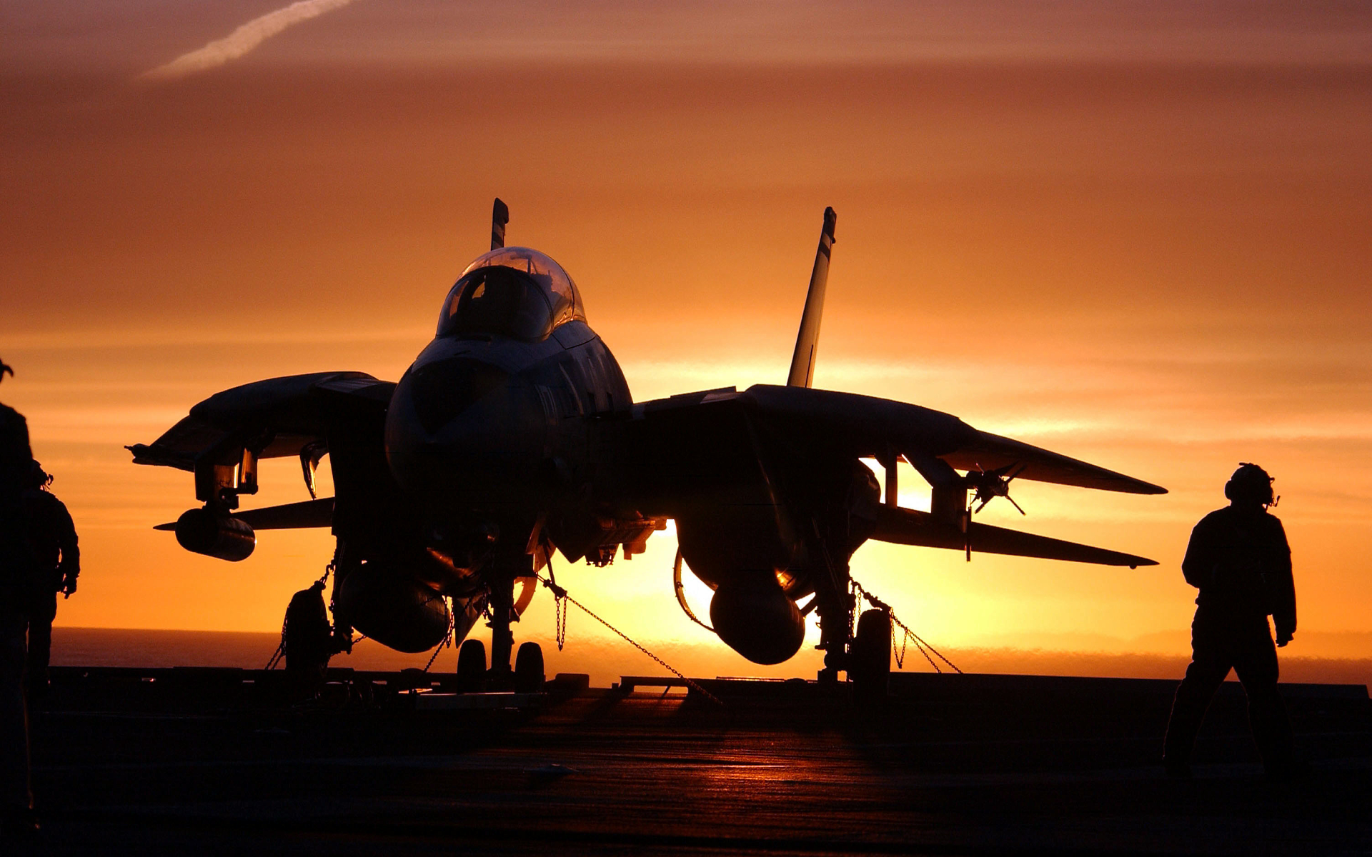 F-14 Tomcat on aircraft carrier at sunset HD Wallpaper