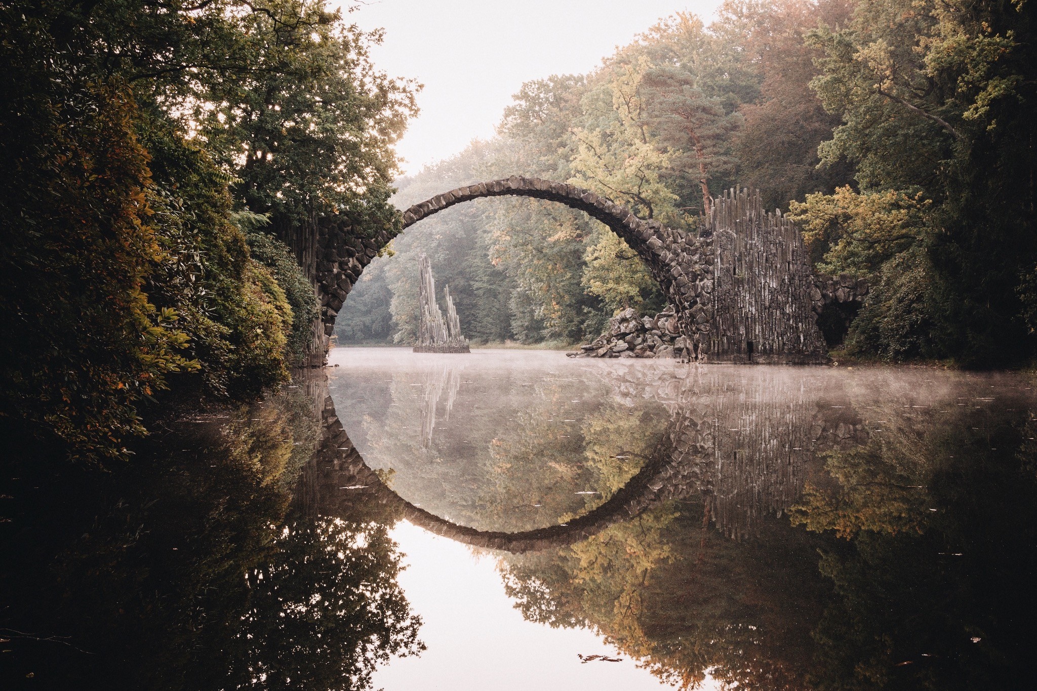 Stone Arch Bridge Over Misty Autumn Lake HD Wallpaper
