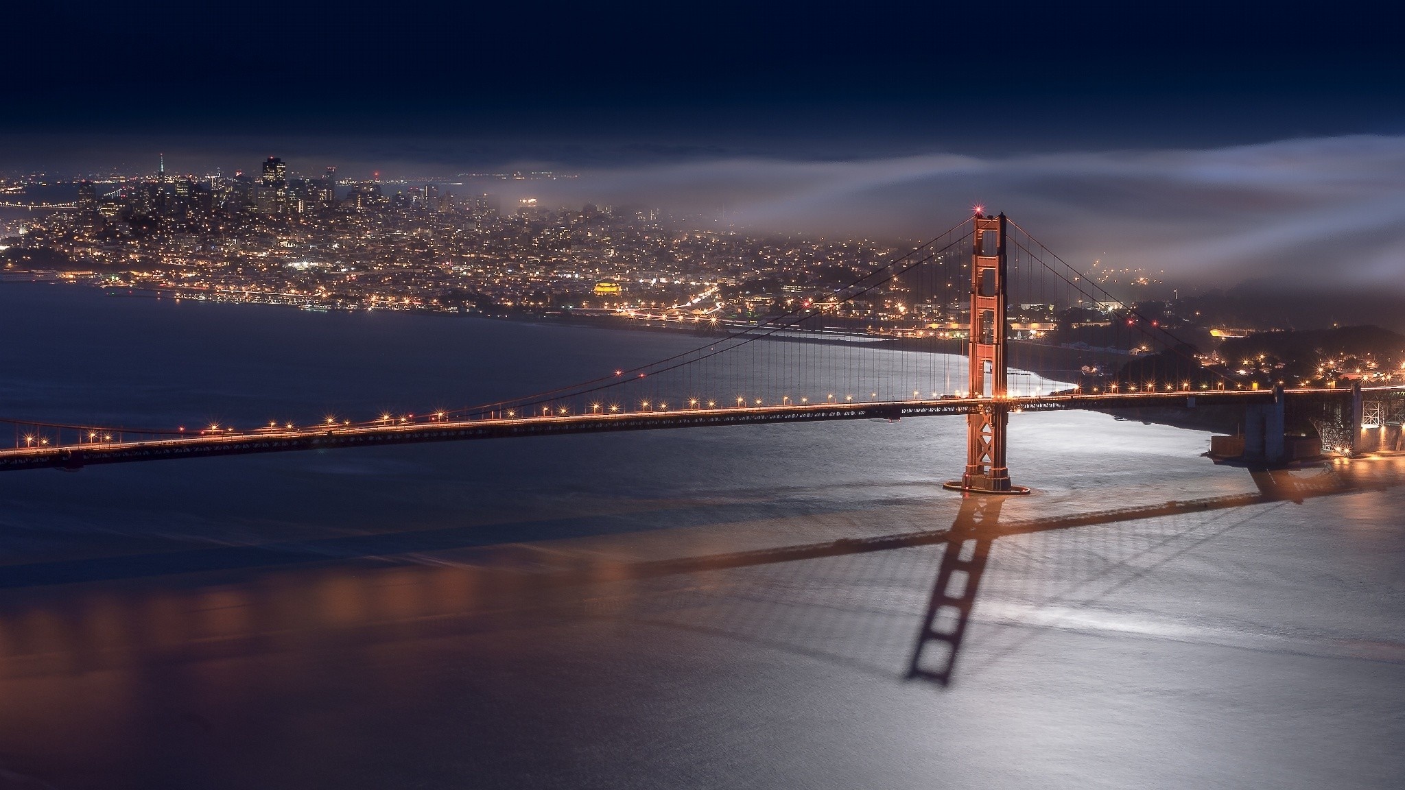 Golden Gate Bridge at night with San Francisco skyline HD Wallpaper