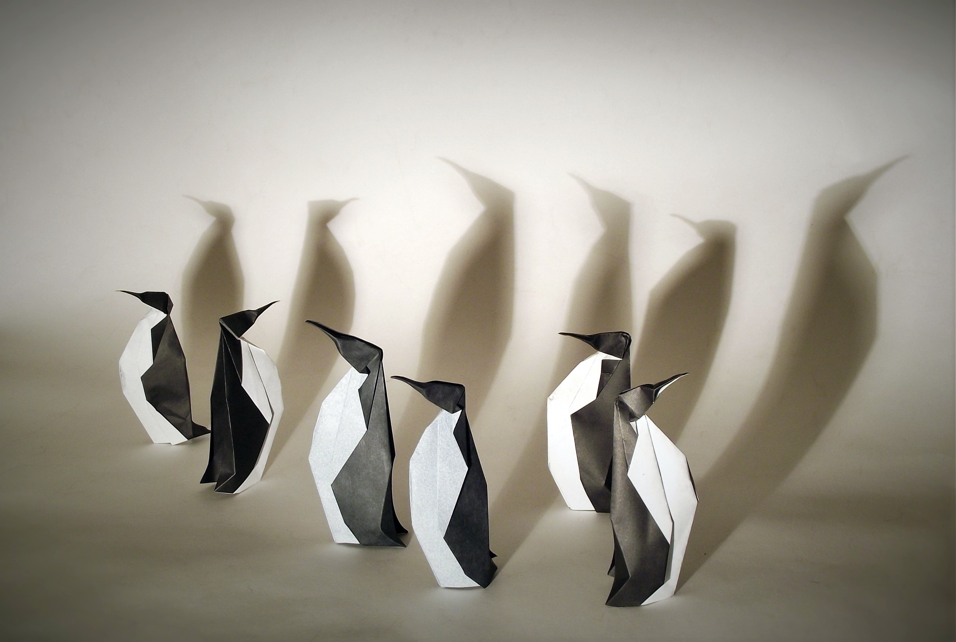 Origami penguins casting shadows HD Wallpaper