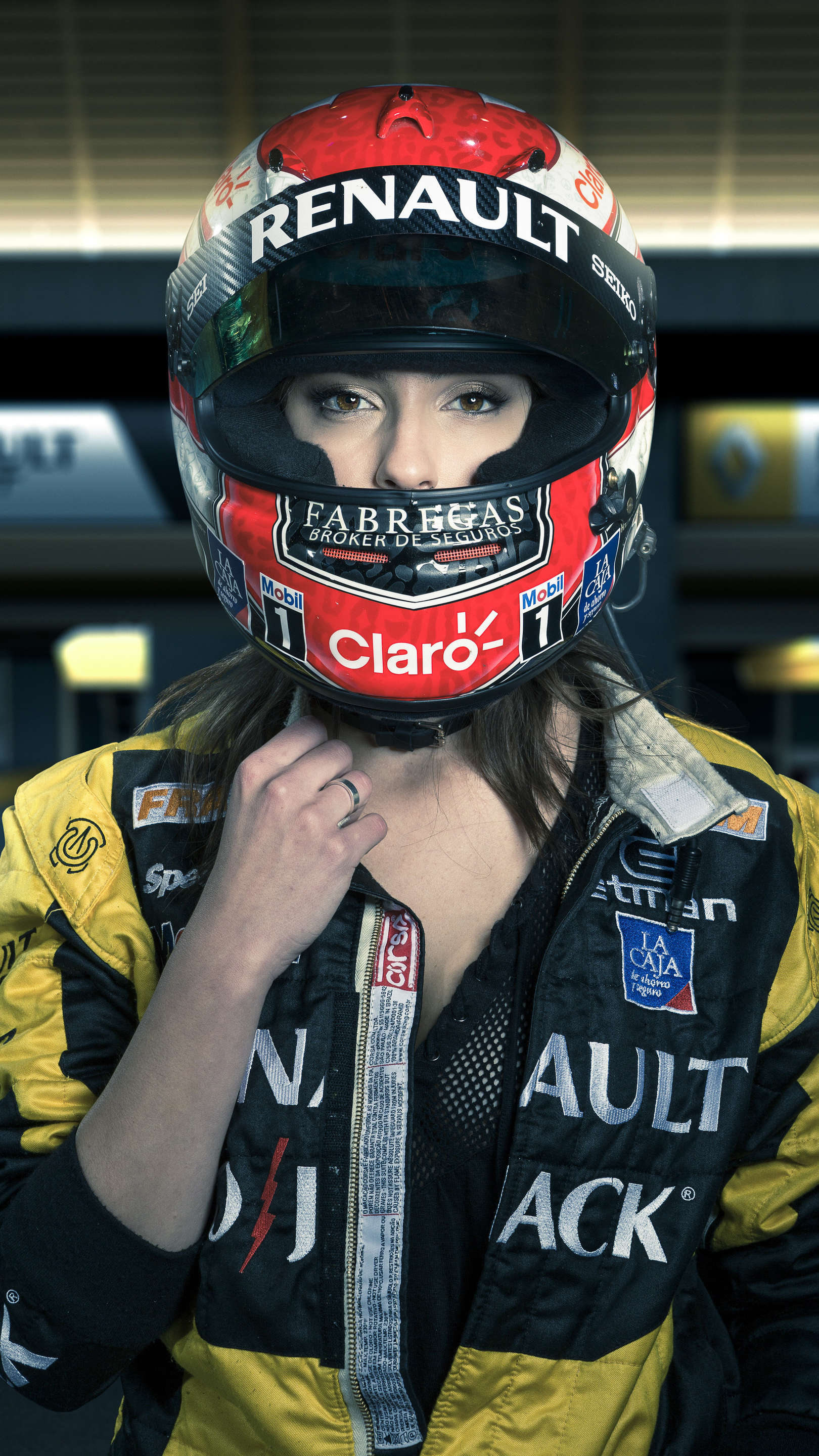Woman in Renault racing helmet and suit HD Wallpaper