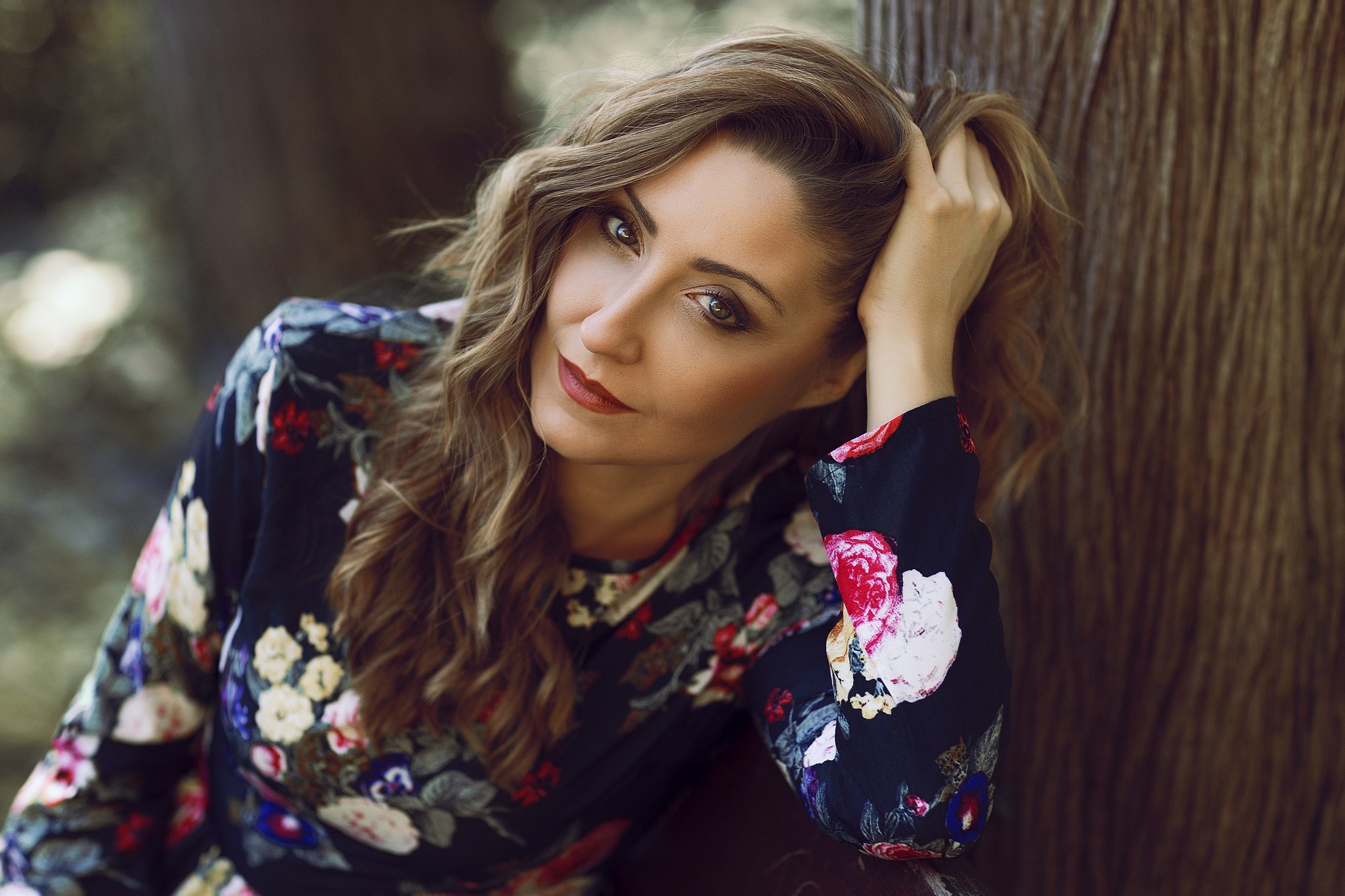Woman with brown hair in a floral dress HD Wallpaper