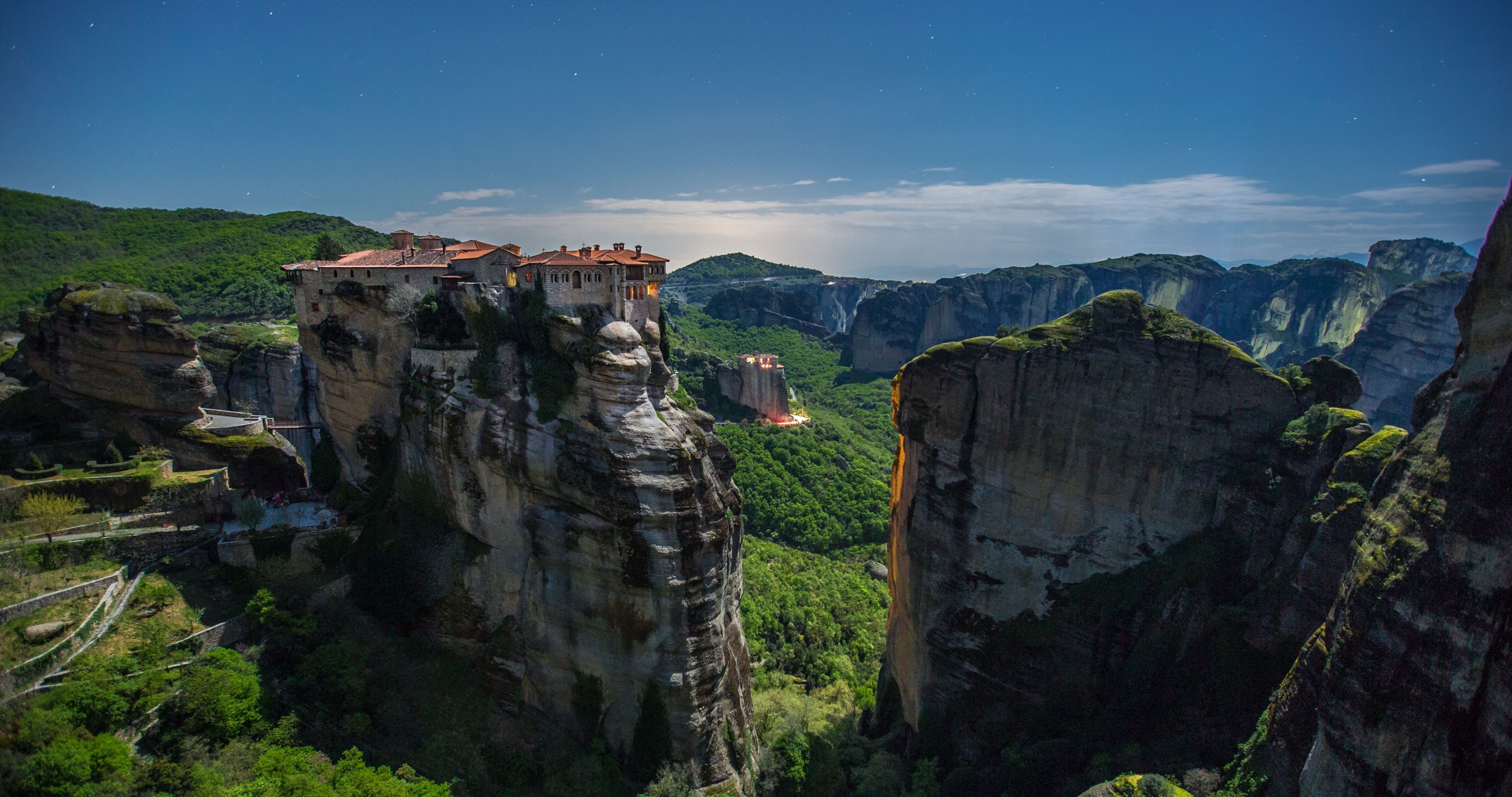 Meteora Monasteries on rock formations in Greece at night HD Wallpaper