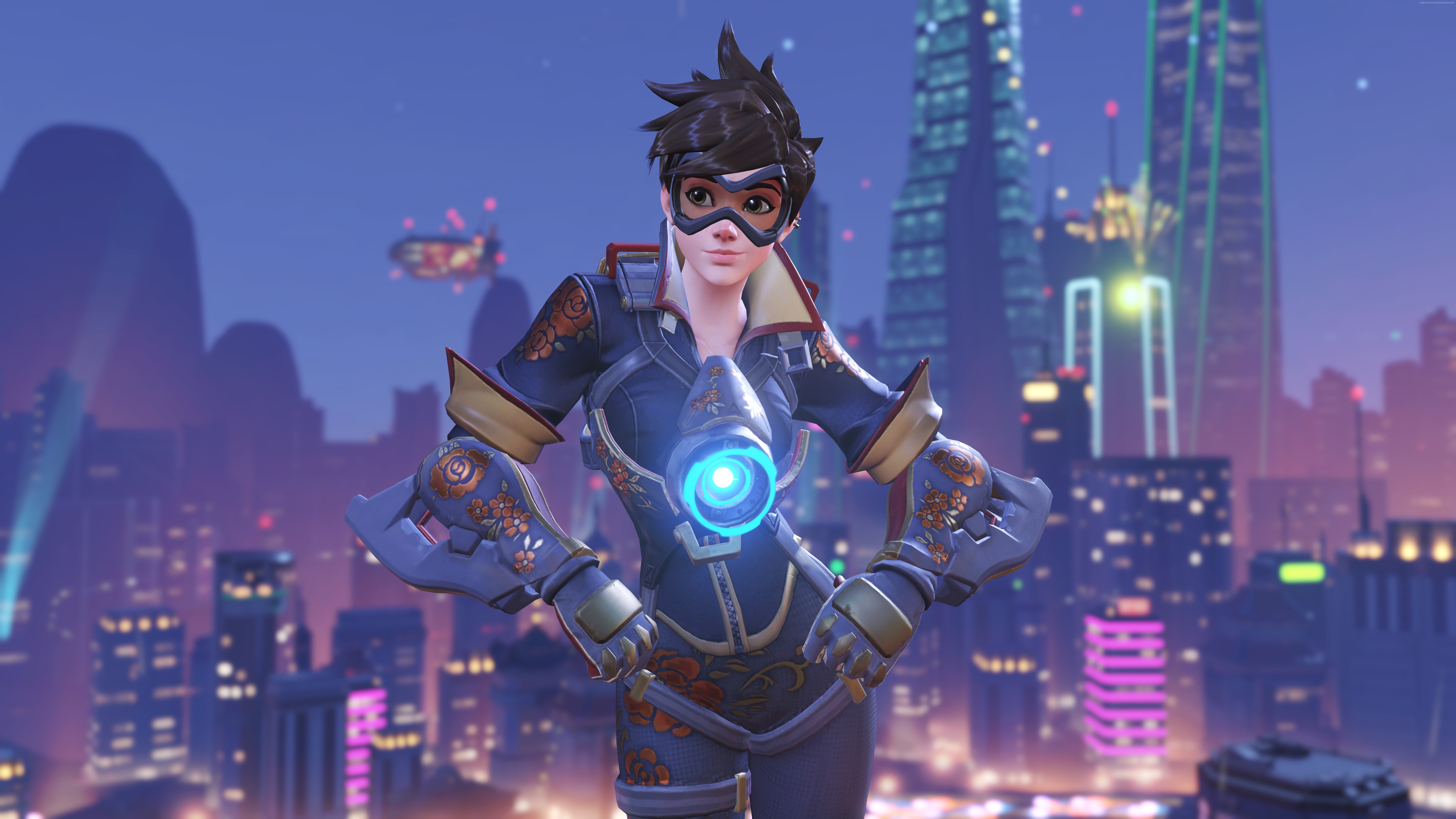 Tracer from Overwatch in a futuristic city HD Wallpaper