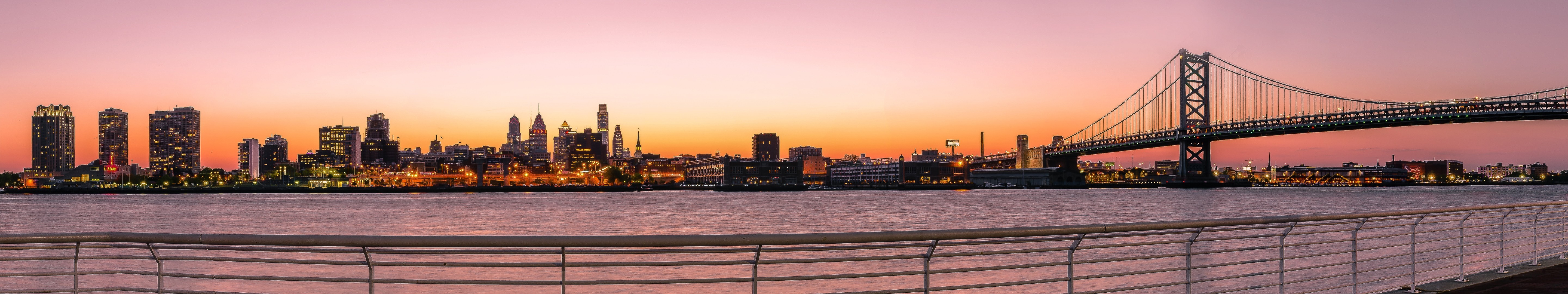 Philadelphia cityscape and Benjamin Franklin Bridge at sunset HD Wallpaper