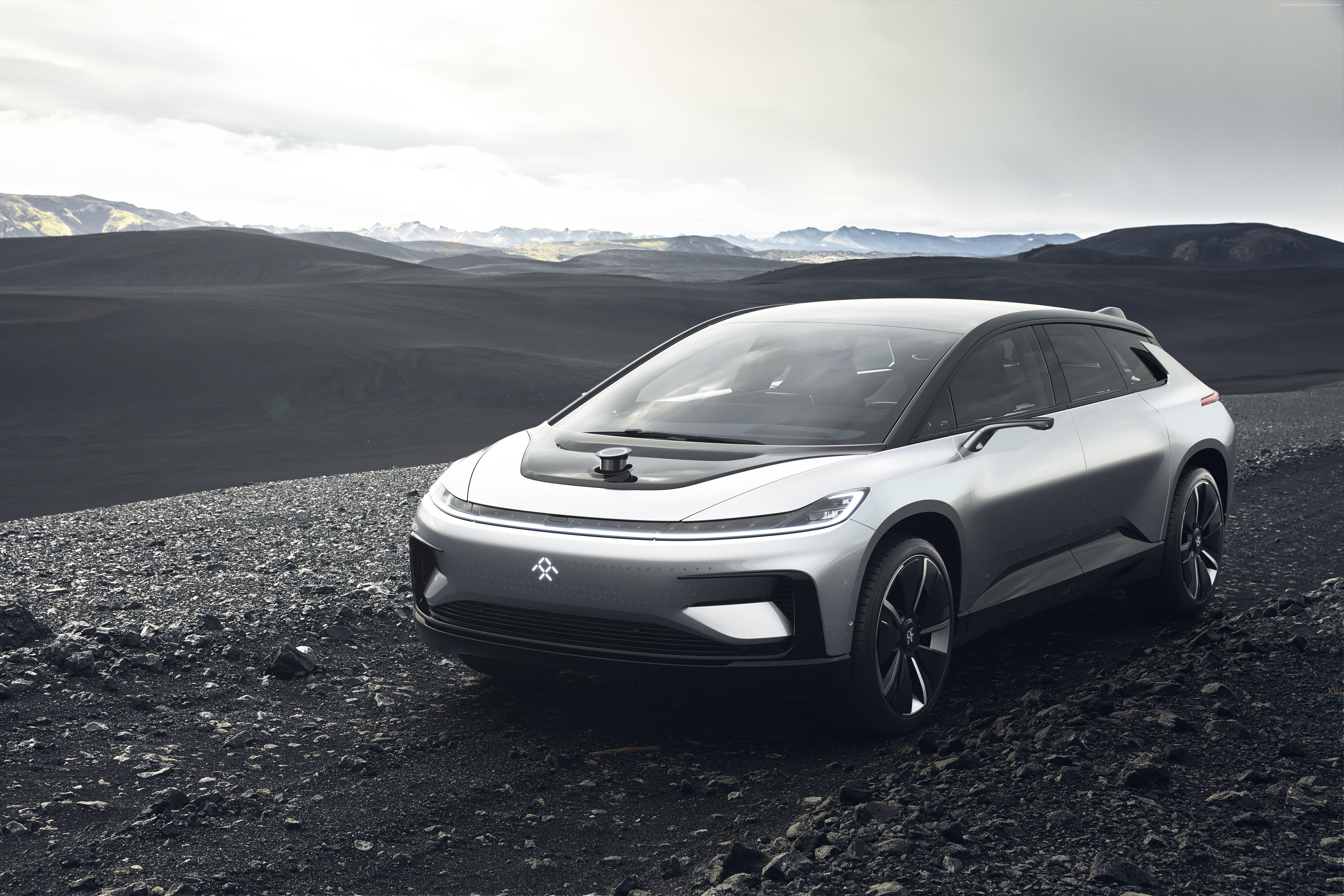 Faraday Future FF91 electric car in a rocky landscape HD Wallpaper