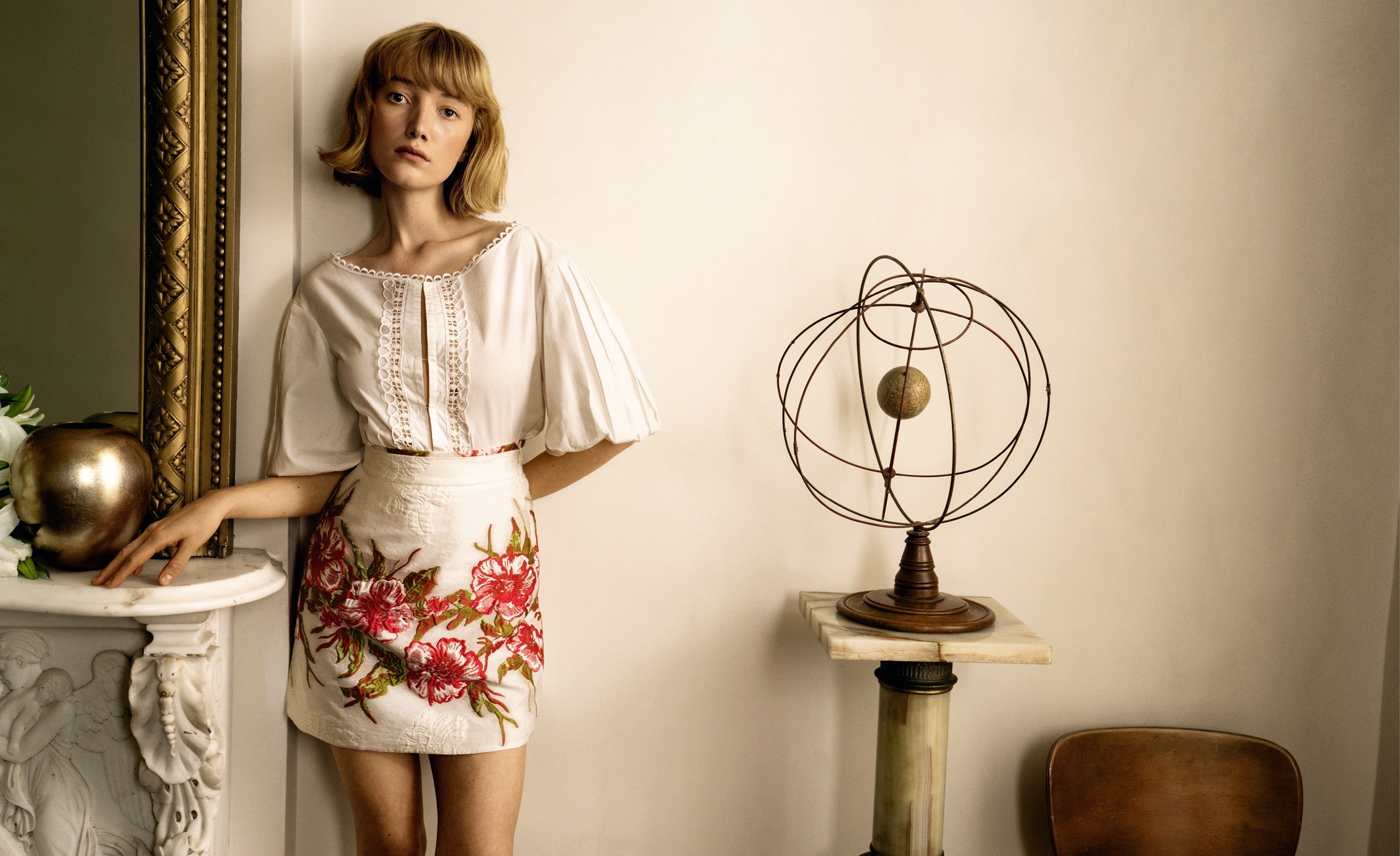 Woman in embroidered skirt and white top HD Wallpaper