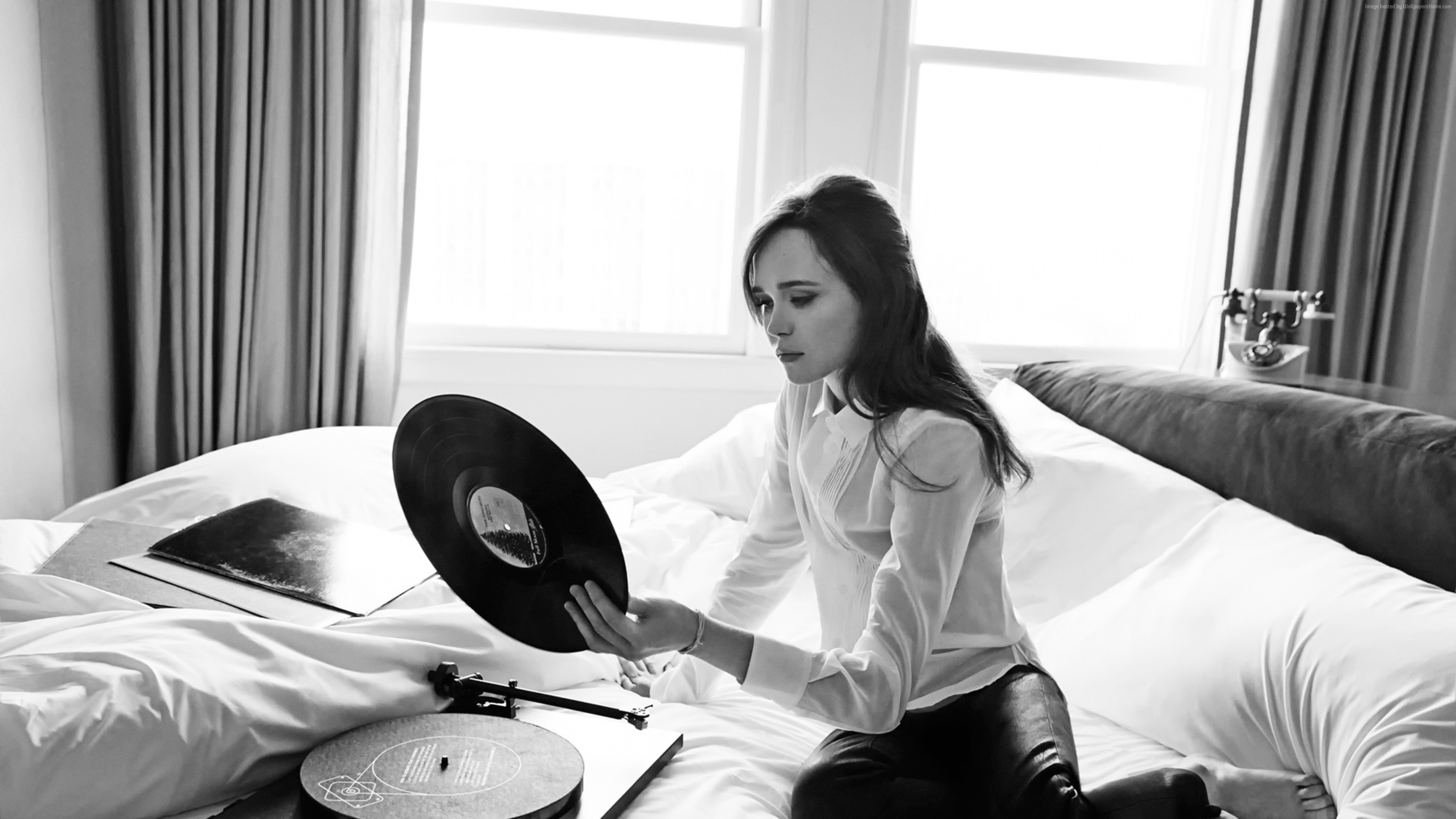 4K photo of Ellen Page with vinyl records HD Wallpaper