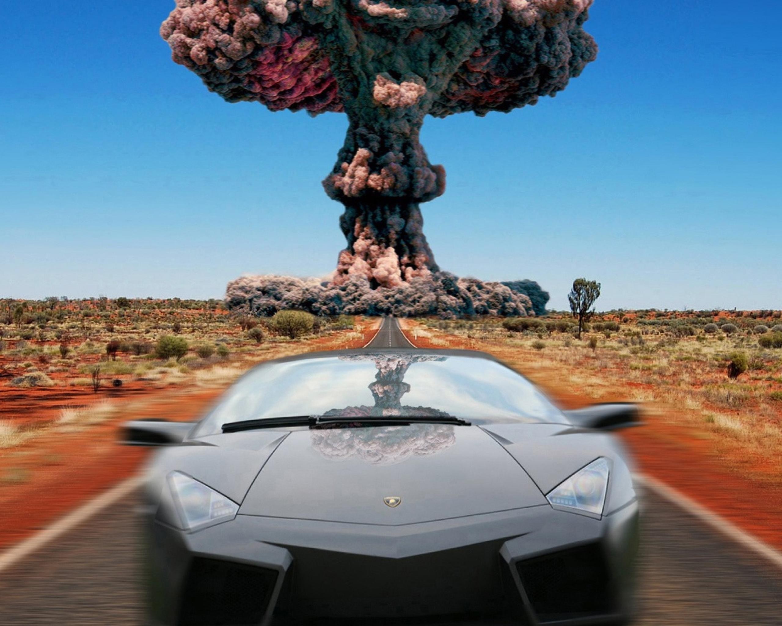 Lamborghini Aventador driving towards nuclear explosion in desert HD Wallpaper