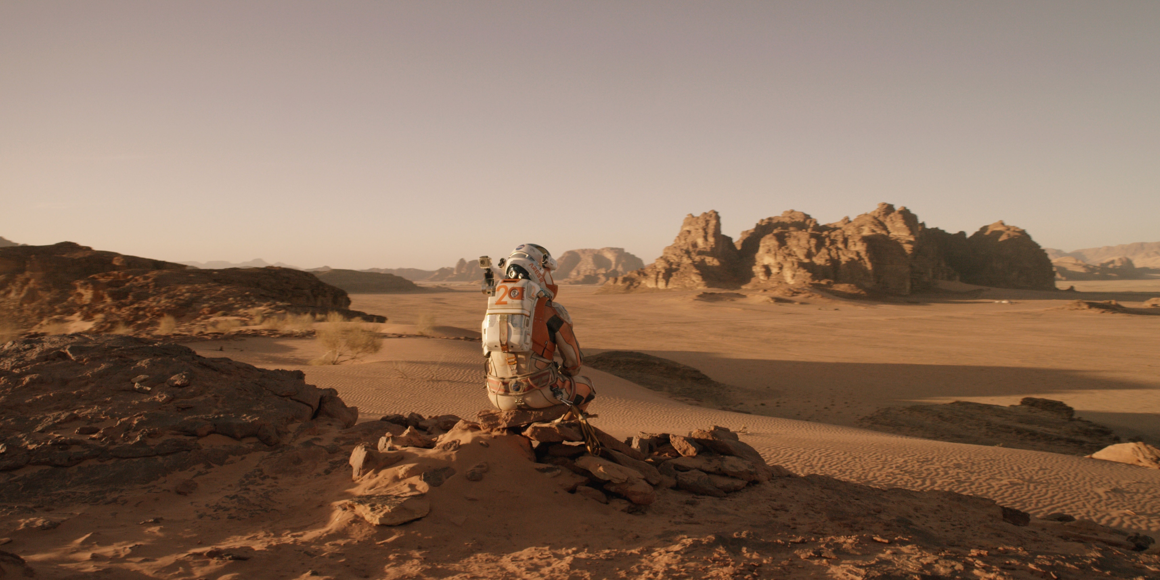 Astronaut in a desert landscape on Mars from The Martian HD Wallpaper