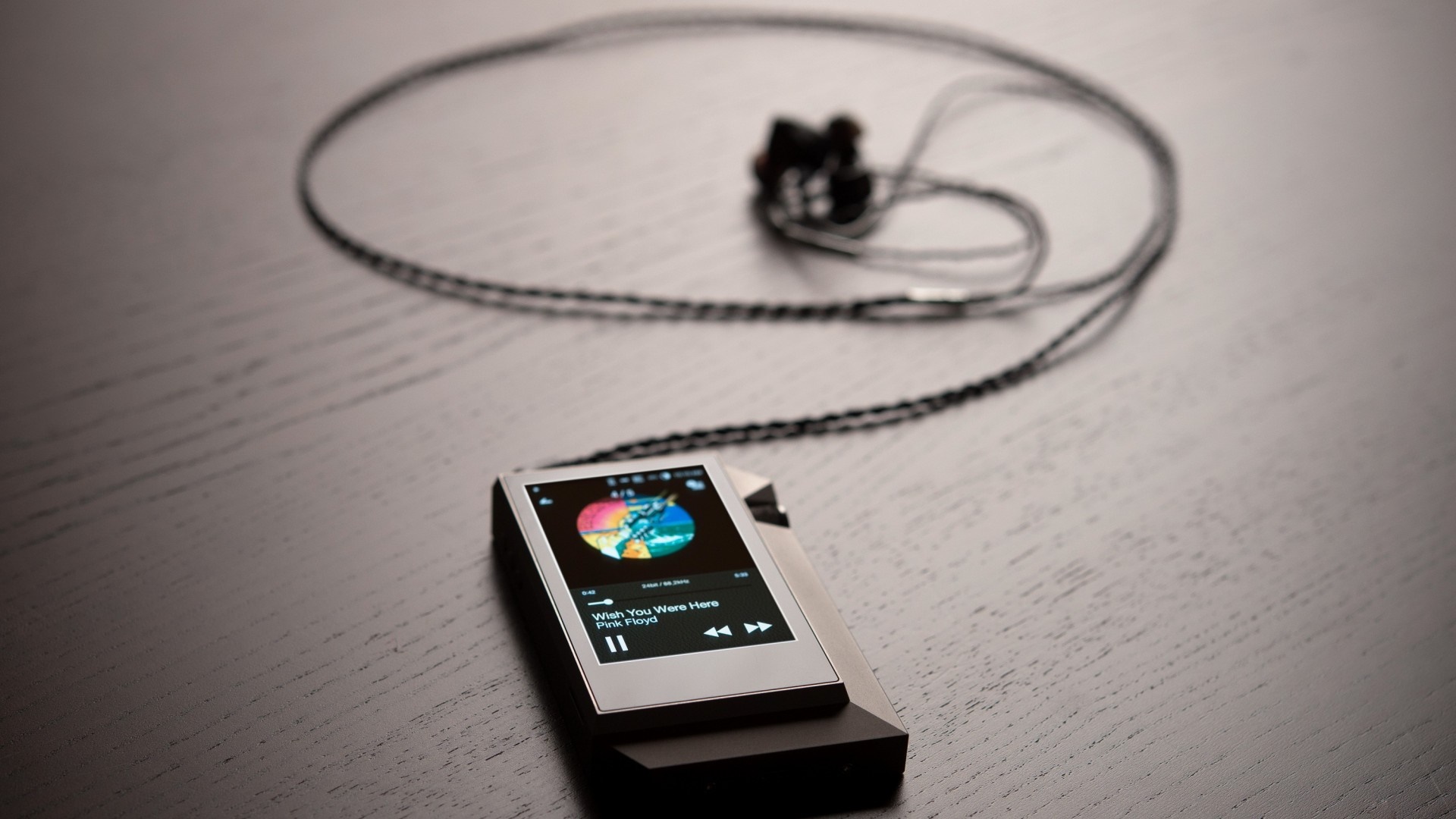 Astell & Kern AK380 digital audio player with earbuds HD Wallpaper
