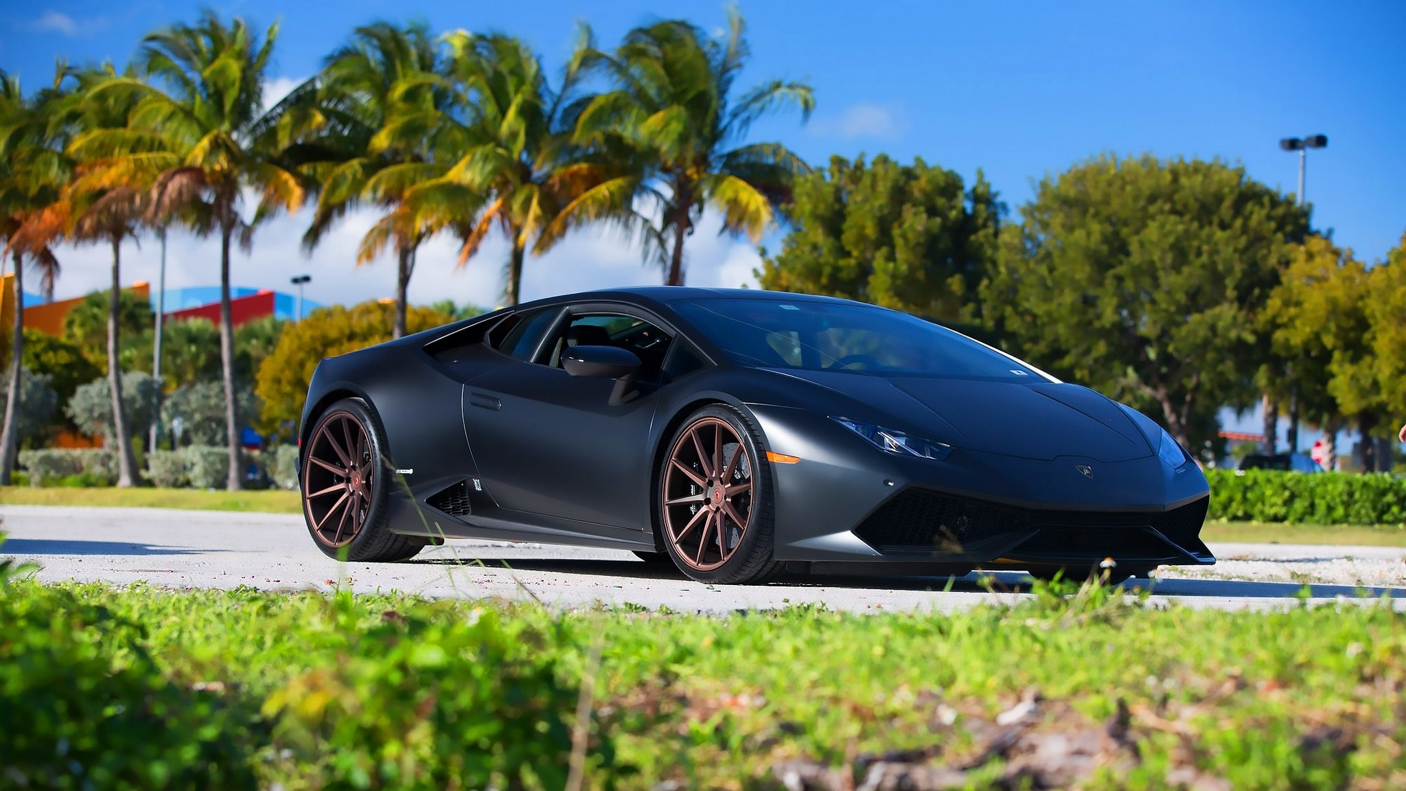 Matte black Lamborghini Huracan with bronze wheels HD Wallpaper