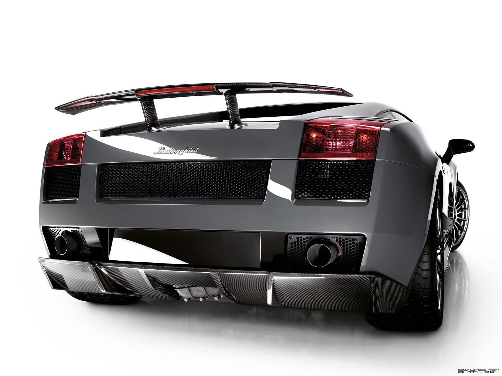 Rear view of a grey Lamborghini Gallardo with a large spoiler HD Wallpaper