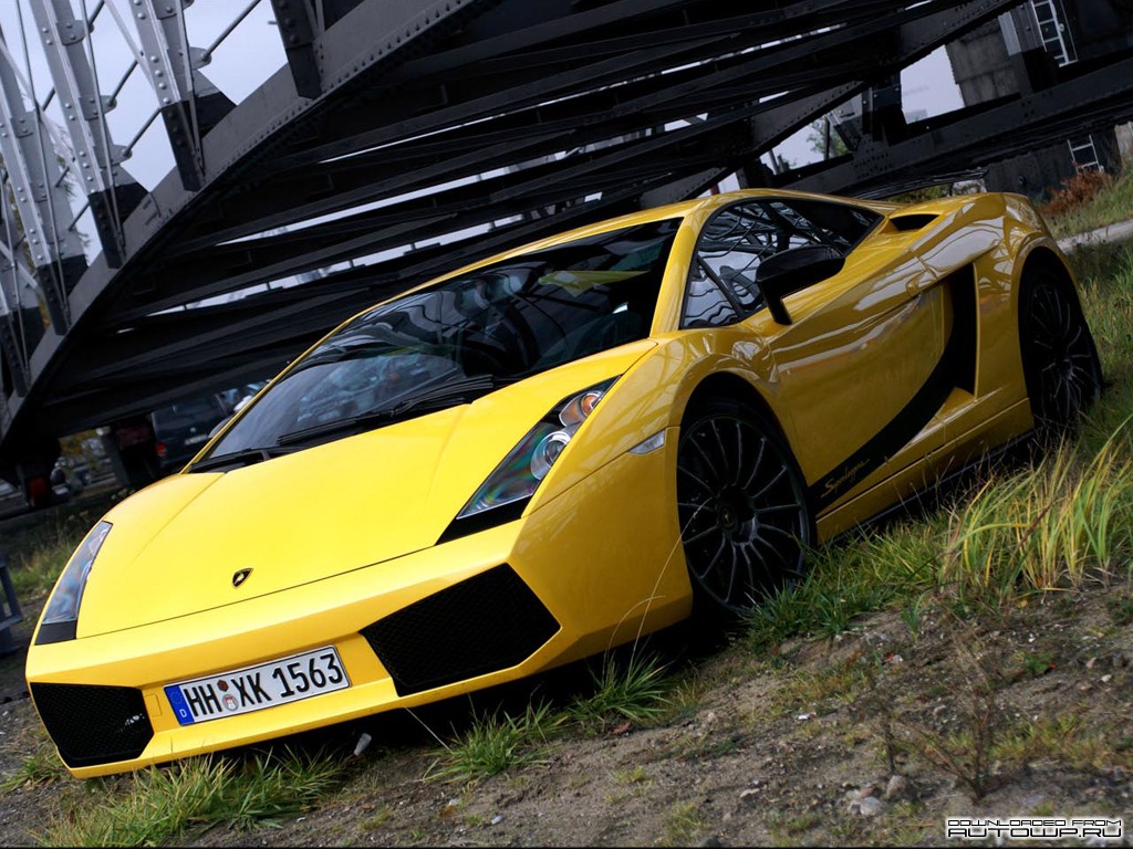 Yellow Lamborghini Gallardo parked under a bridge HD Wallpaper