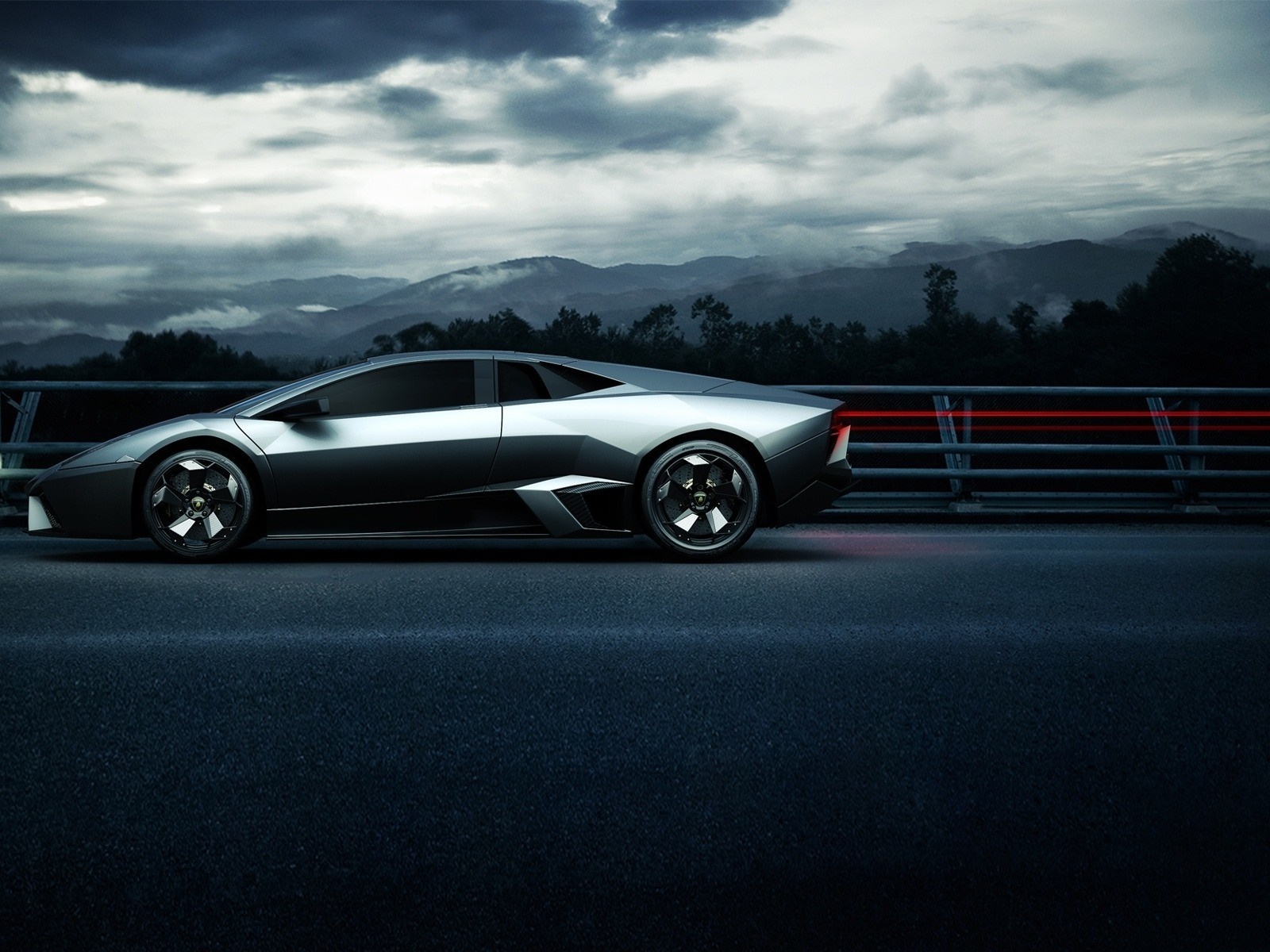 Lamborghini Reventon sports car on a road HD Wallpaper