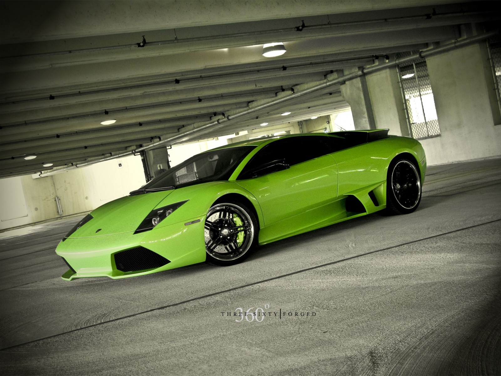 Green Lamborghini Aventador parked in a concrete garage HD Wallpaper