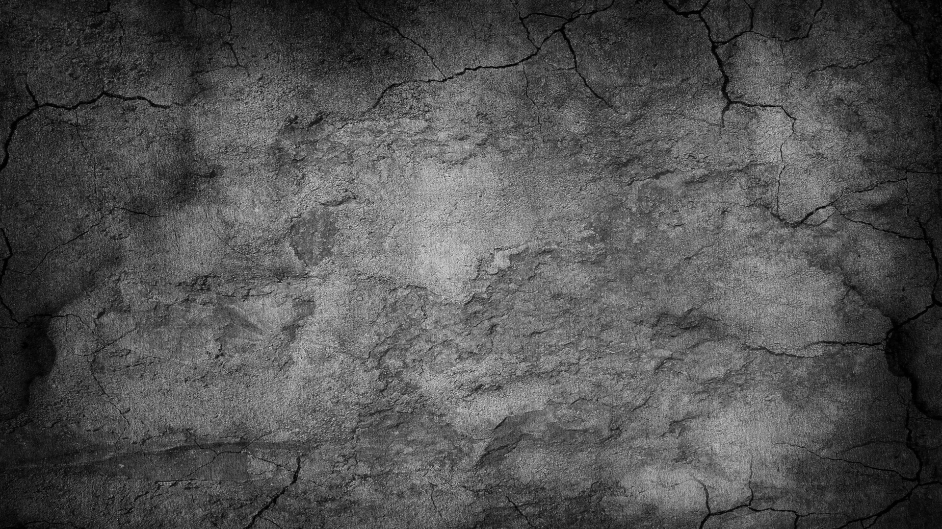 Cracked concrete wall texture with dark shadows HD Wallpaper