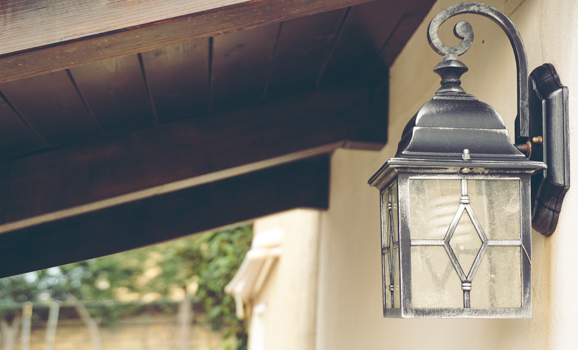 Outdoor lantern hanging from a wooden beam HD Wallpaper