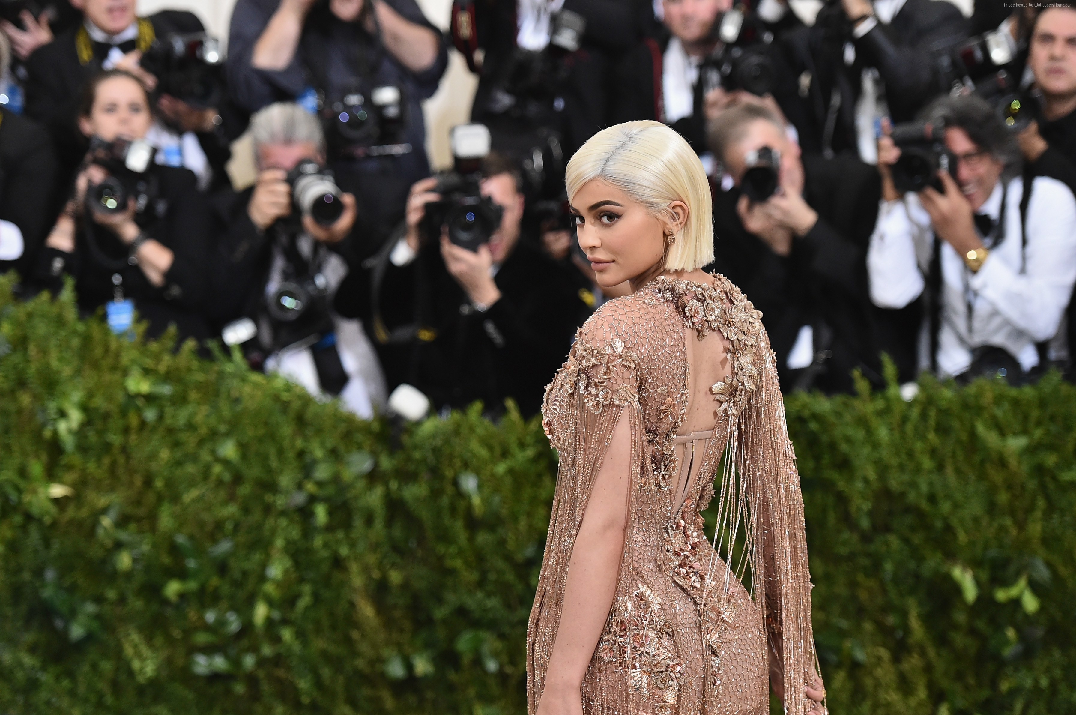 Kylie Jenner at an event with photographers HD Wallpaper