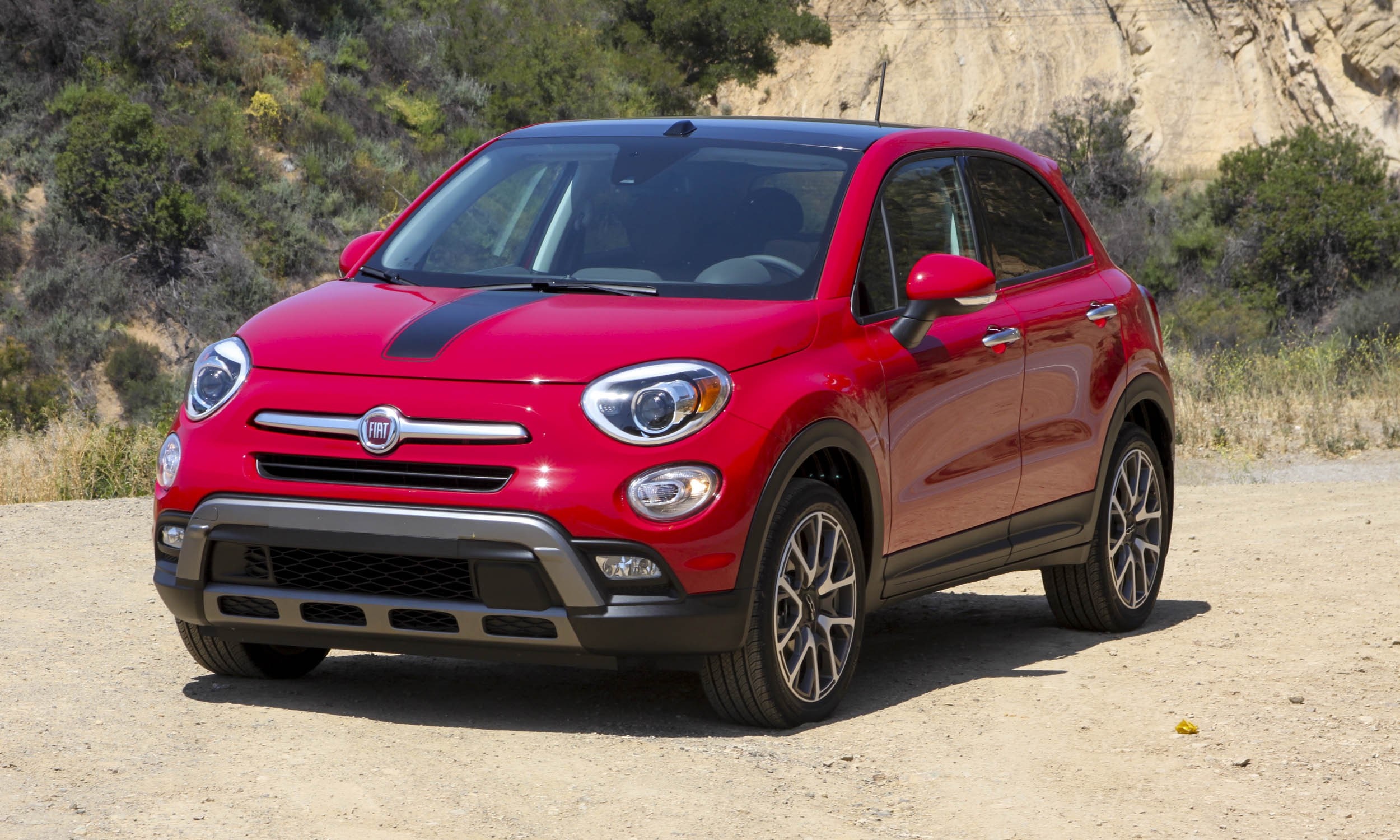Red Fiat 500X parked on a dirt road HD Wallpaper