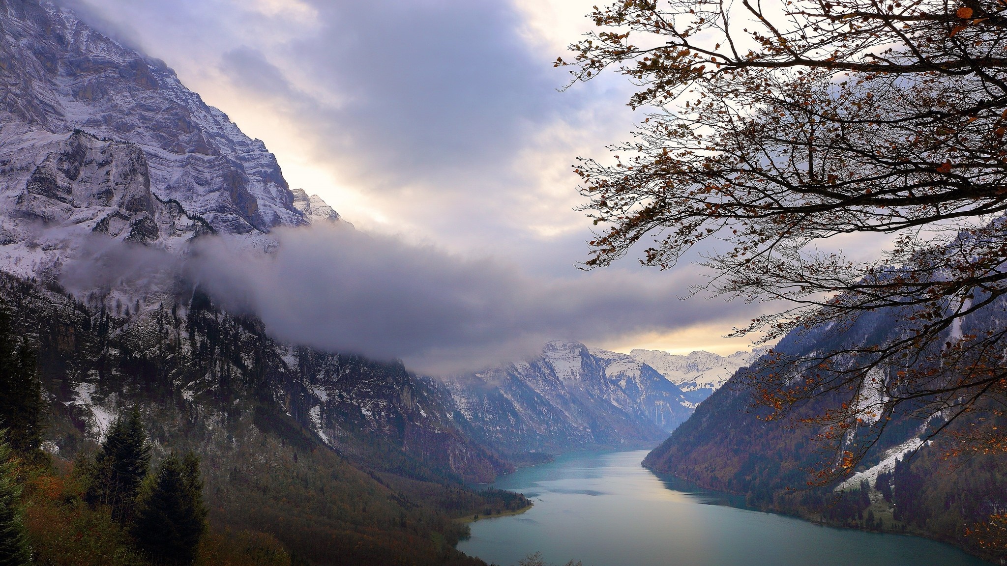 Snowy mountains and a lake in Switzerland during fall HD Wallpaper