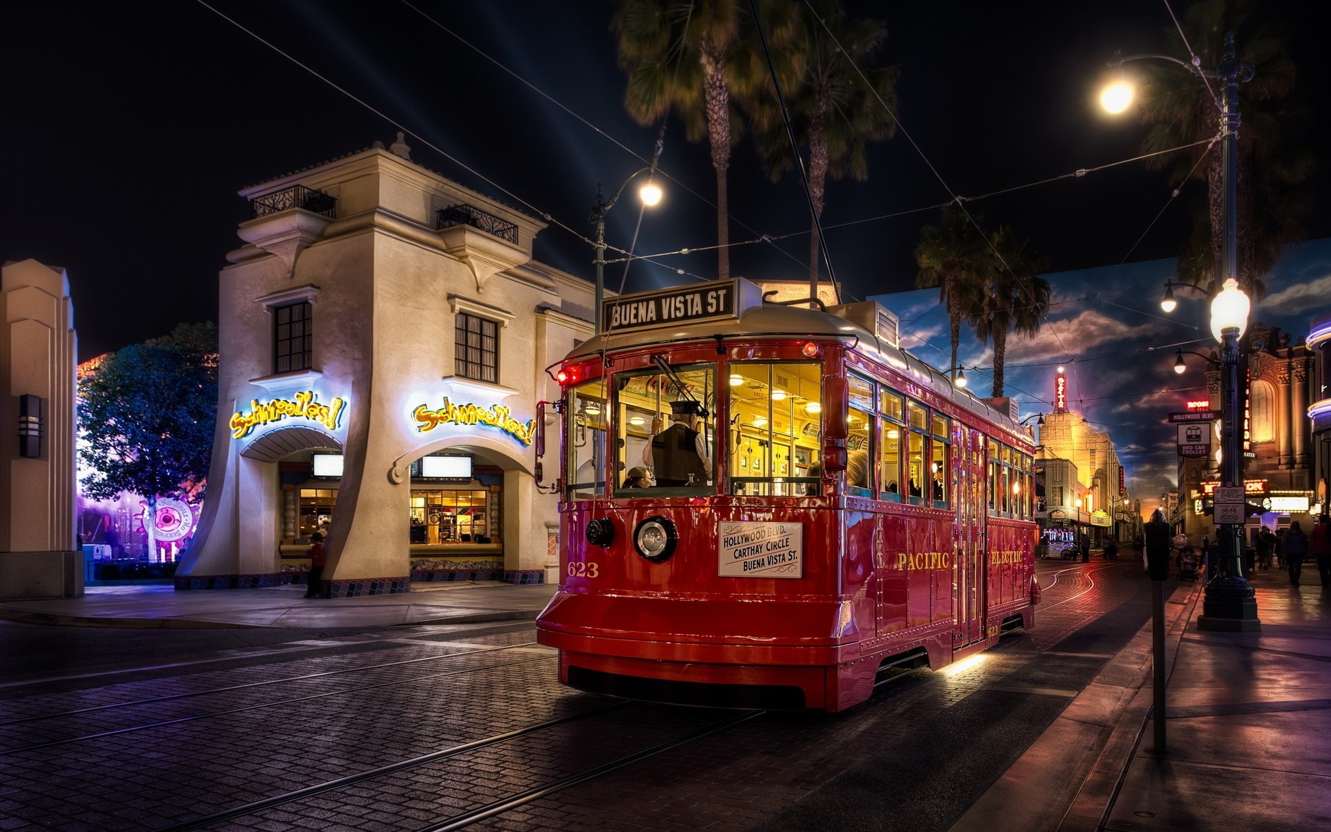 Red trolley car on Buena Vista Street at night HD Wallpaper