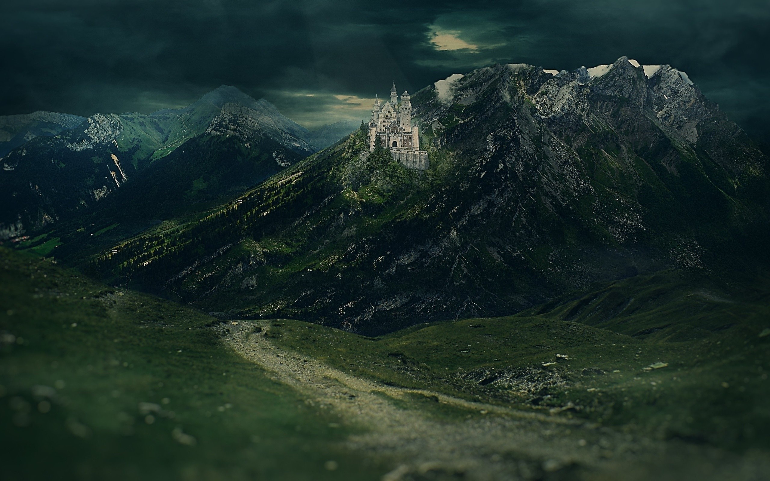 Castle on a mountain peak in a dark landscape HD Wallpaper