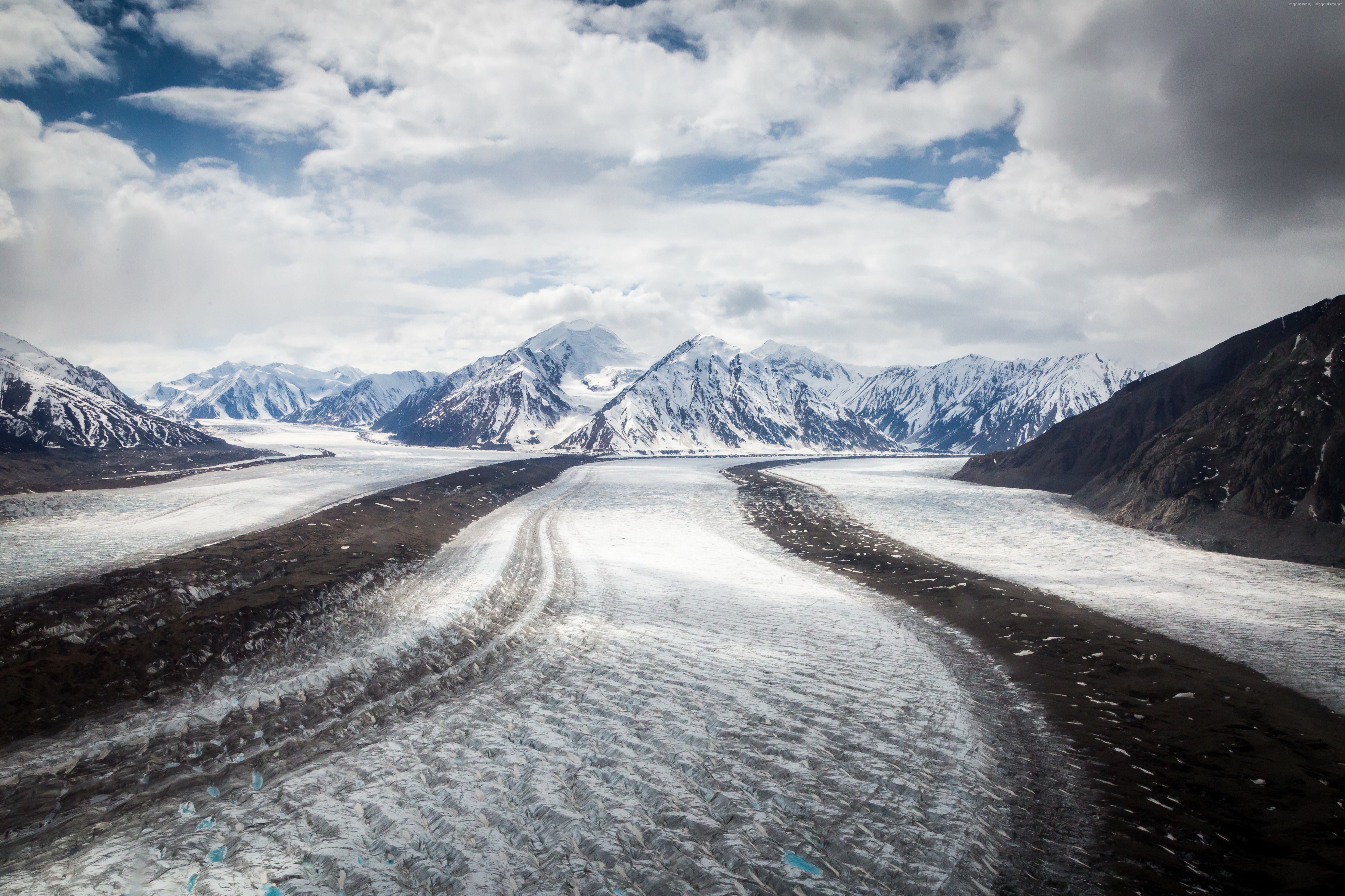 Glacier and snow-capped mountains under cloudy sky HD Wallpaper