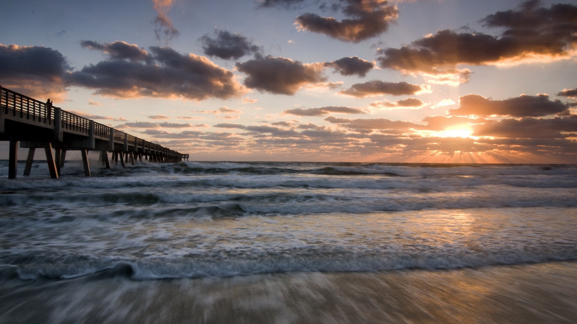 Sunrise over the ocean with a pier HD Wallpaper
