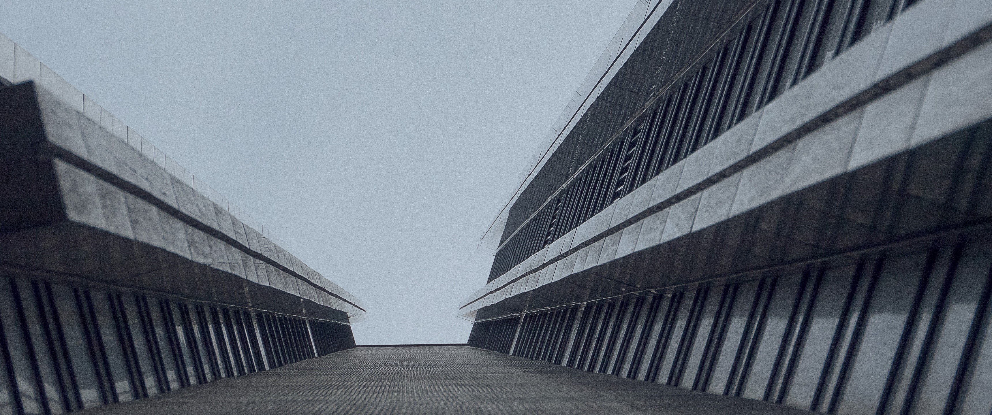 Modern architecture with repeating lines and geometric shapes HD Wallpaper