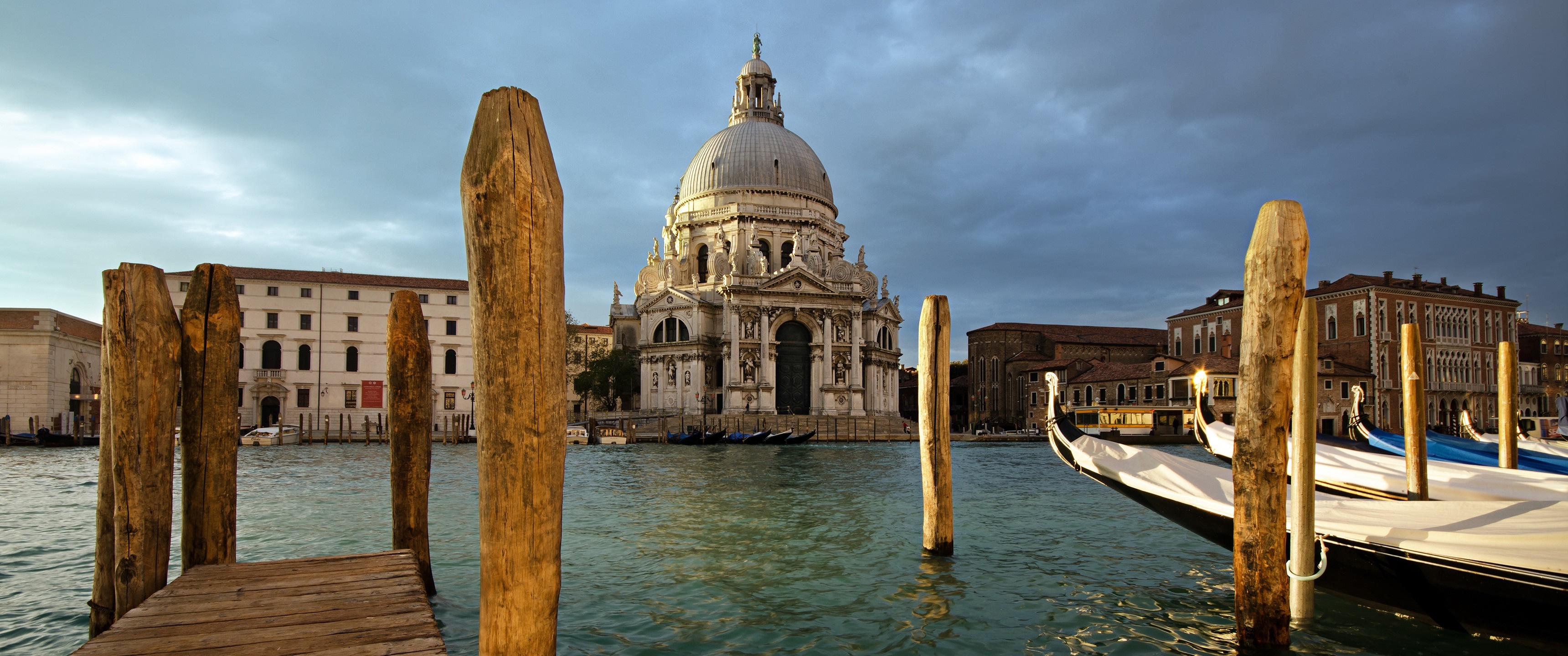 Venice cityscape with Basilica di Santa Maria della Salute and gondolas HD Wallpaper