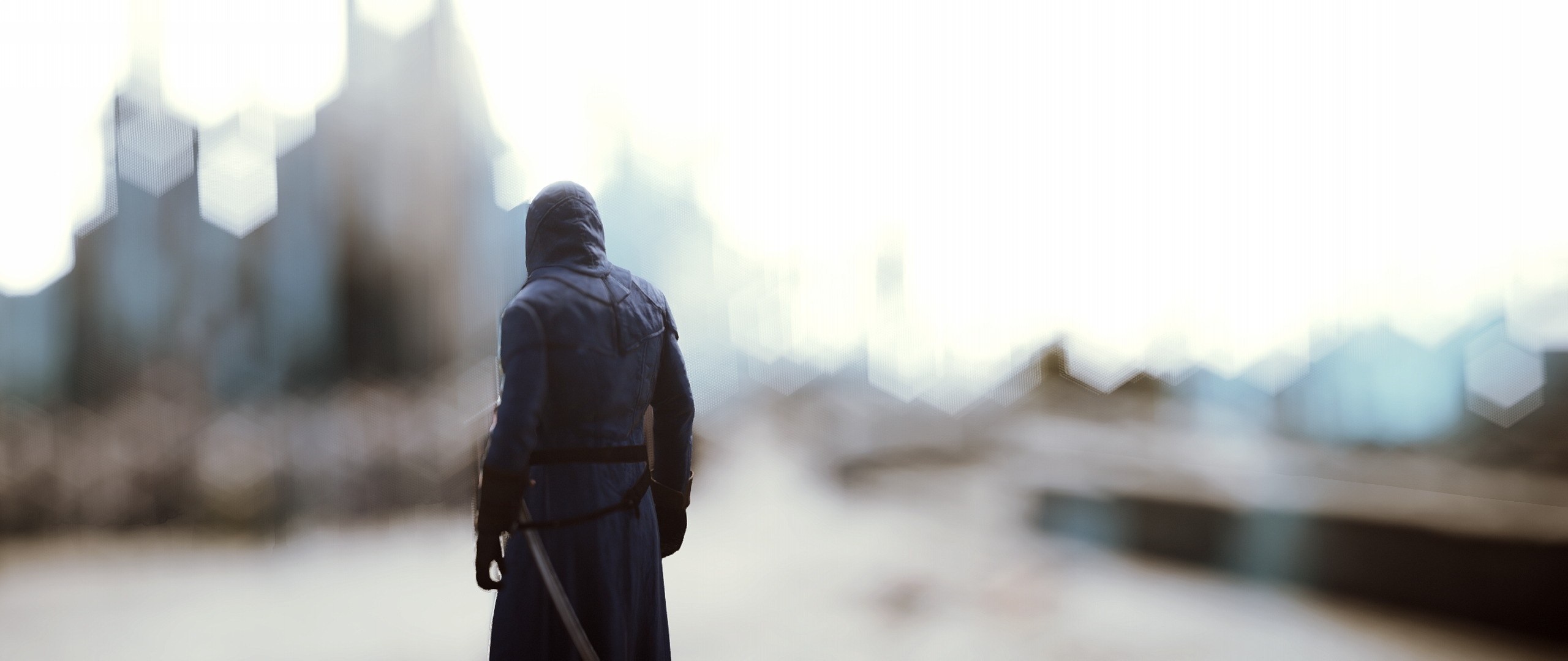 Man in hooded cloak with sword HD Wallpaper