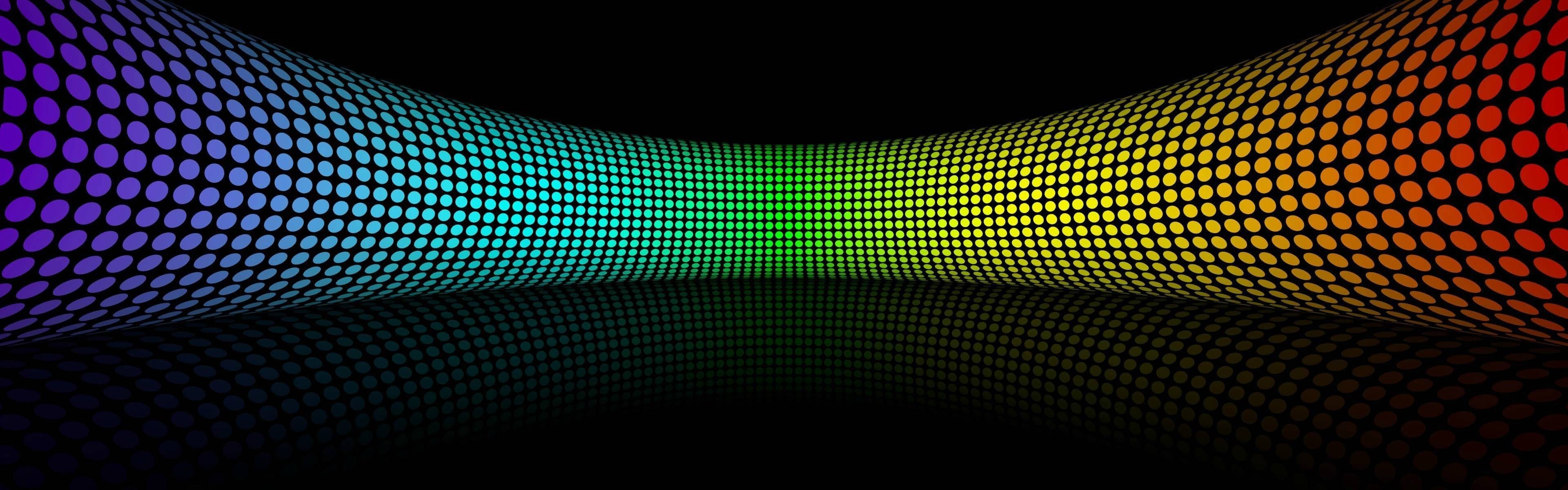 Abstract rainbow-colored dots forming a wave pattern HD Wallpaper
