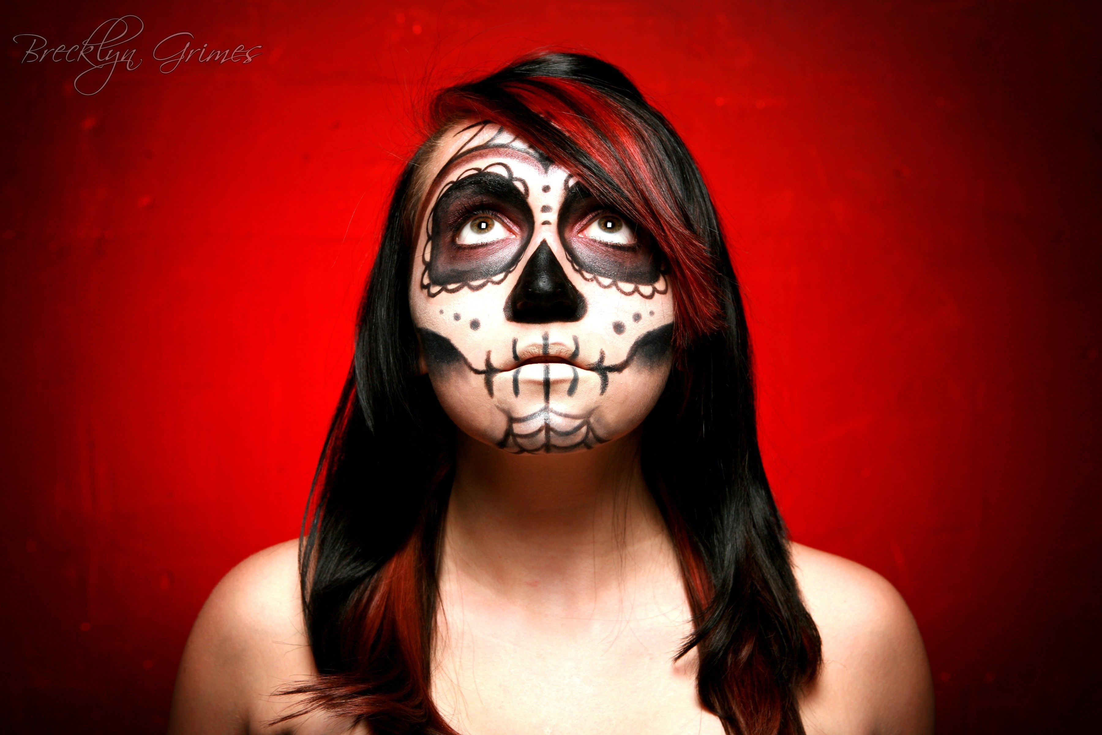 Woman with Sugar Skull makeup and red background HD Wallpaper